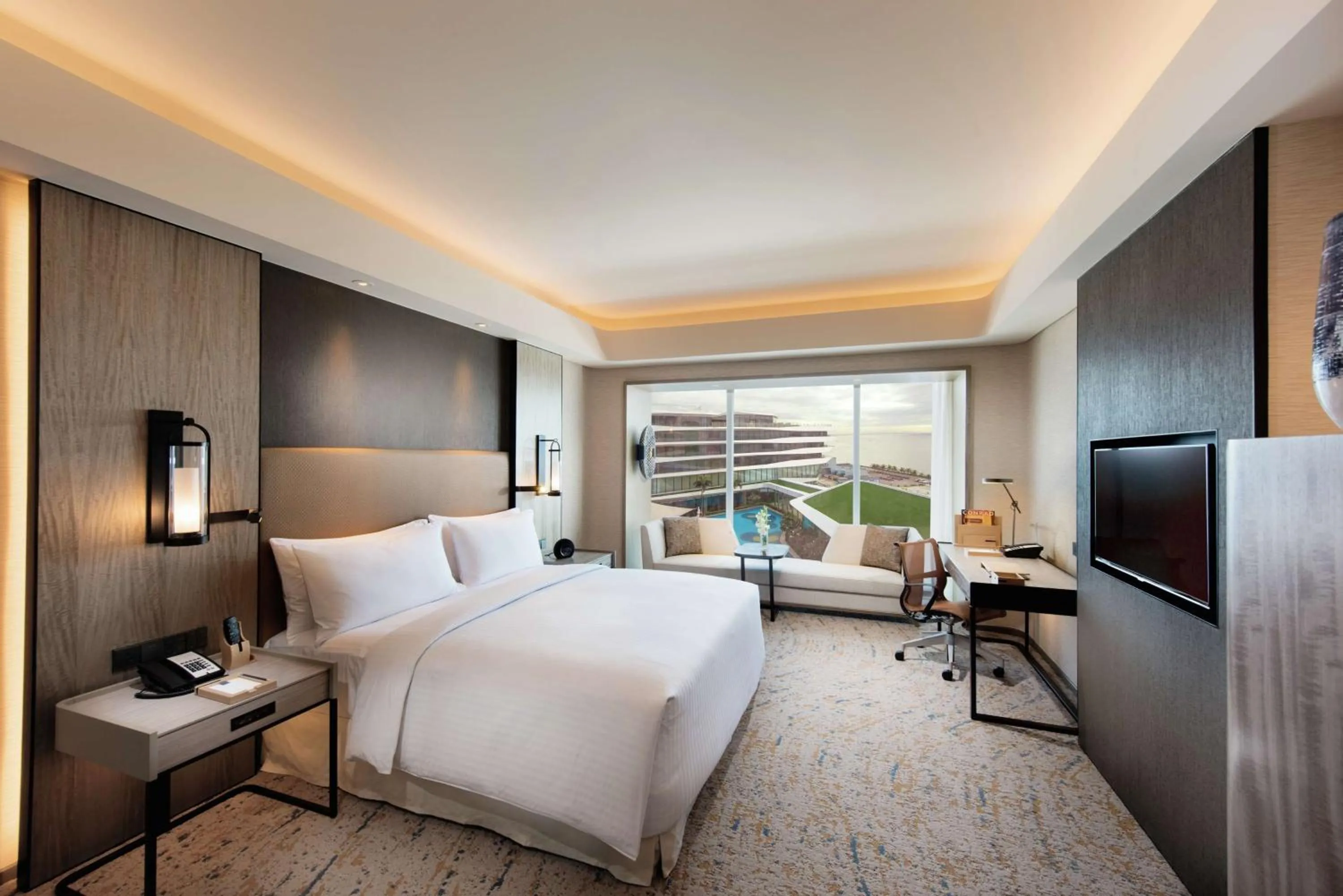 Deluxe King Room with Pool View and Partial Bay View in Conrad Manila