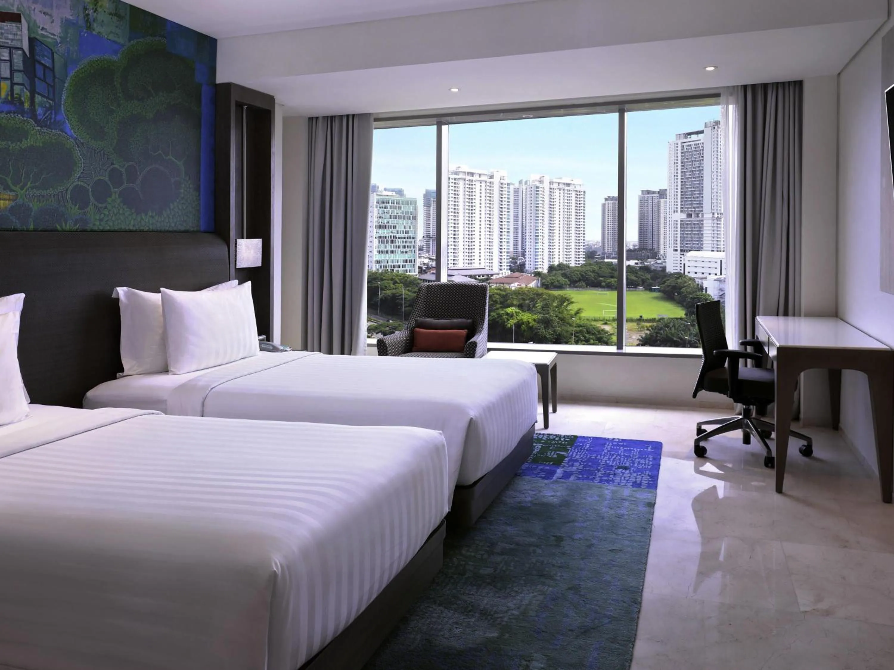 Deluxe Twin Room in Grand Mercure Jakarta Kemayoran