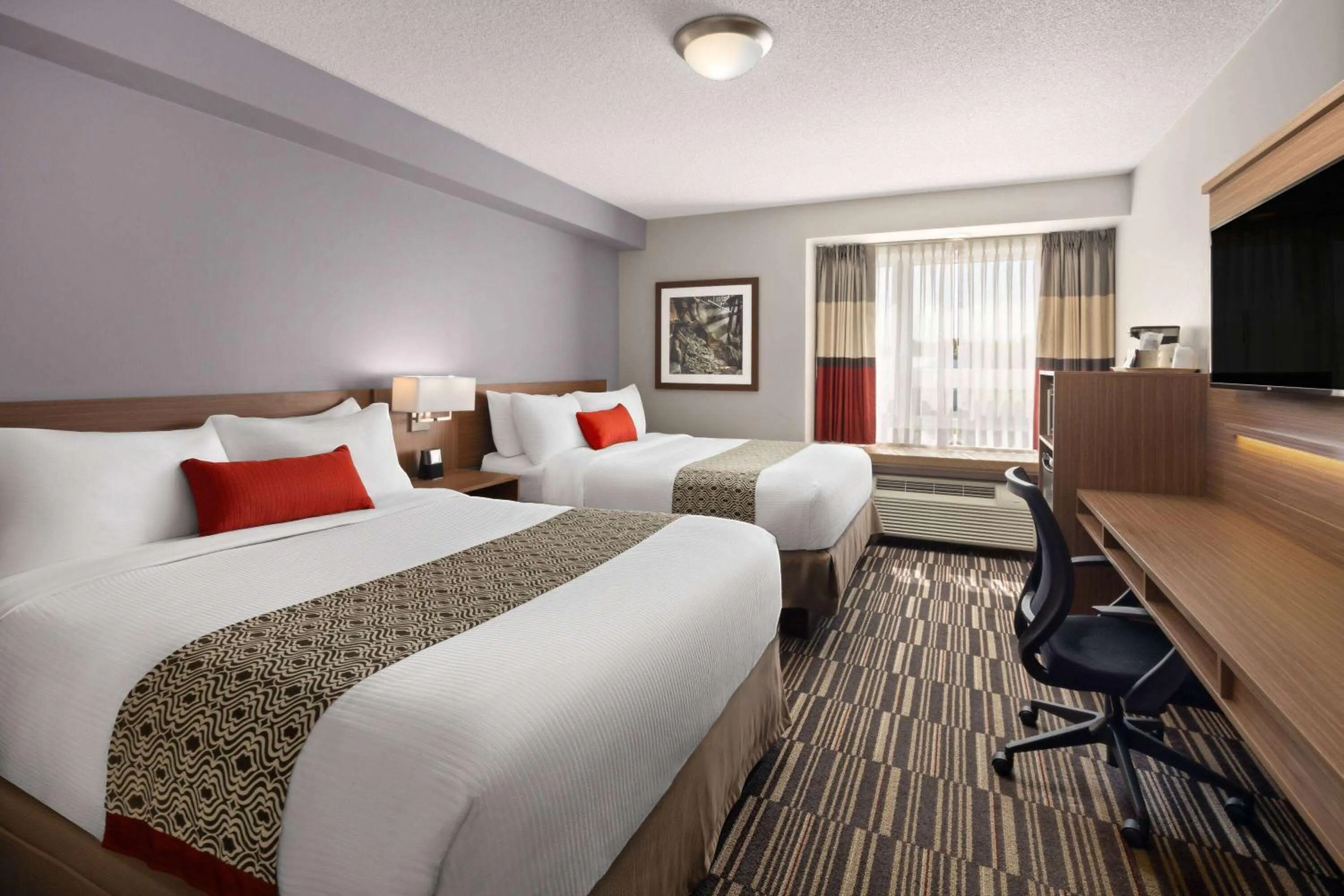 Queen Room with Two Queen Beds - Non-Smoking in Microtel Inn & Suites by Wyndham Kirkland Lake
