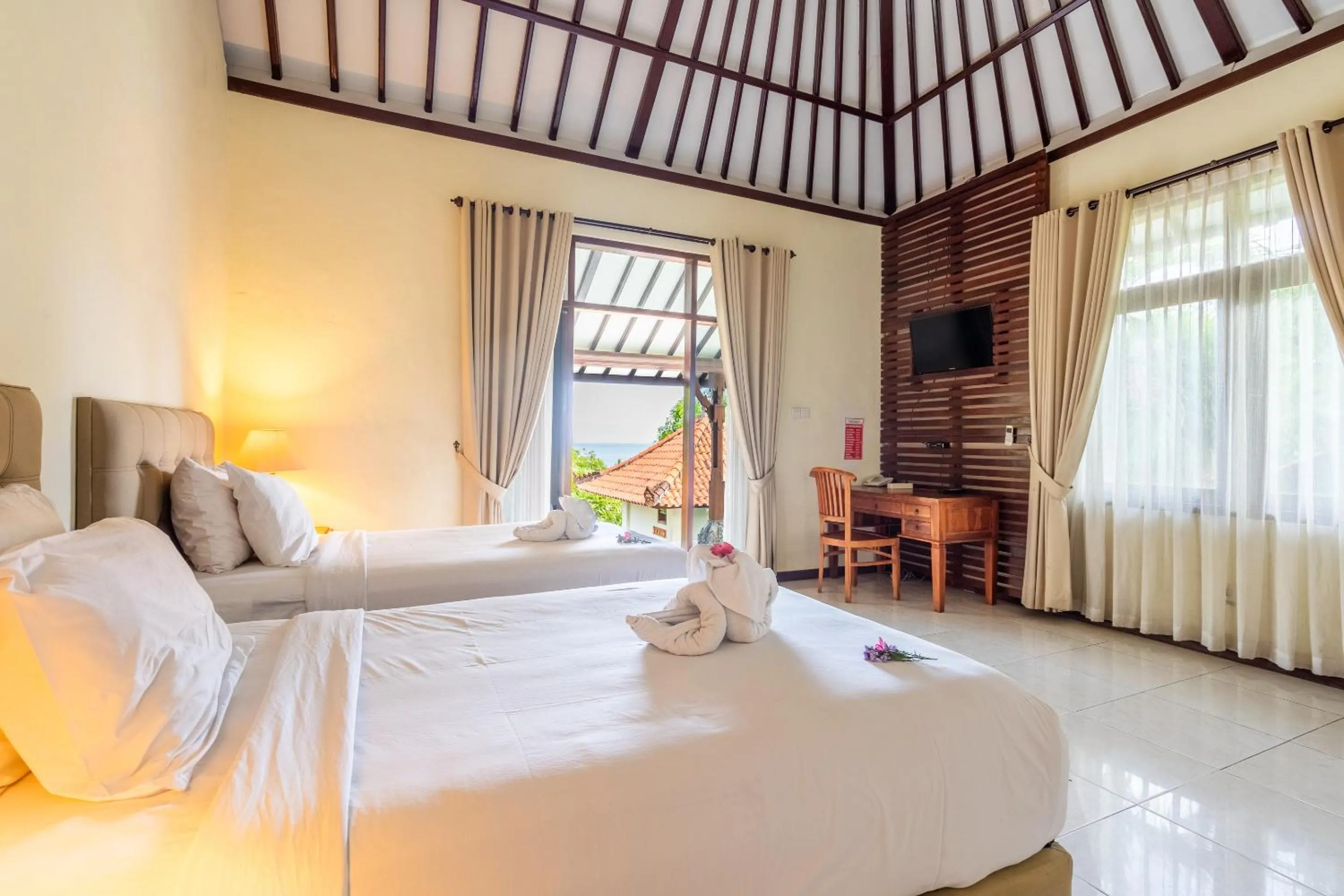 Deluxe Two Bedroom with Garden View in Taman Surgawi Resort & Spa