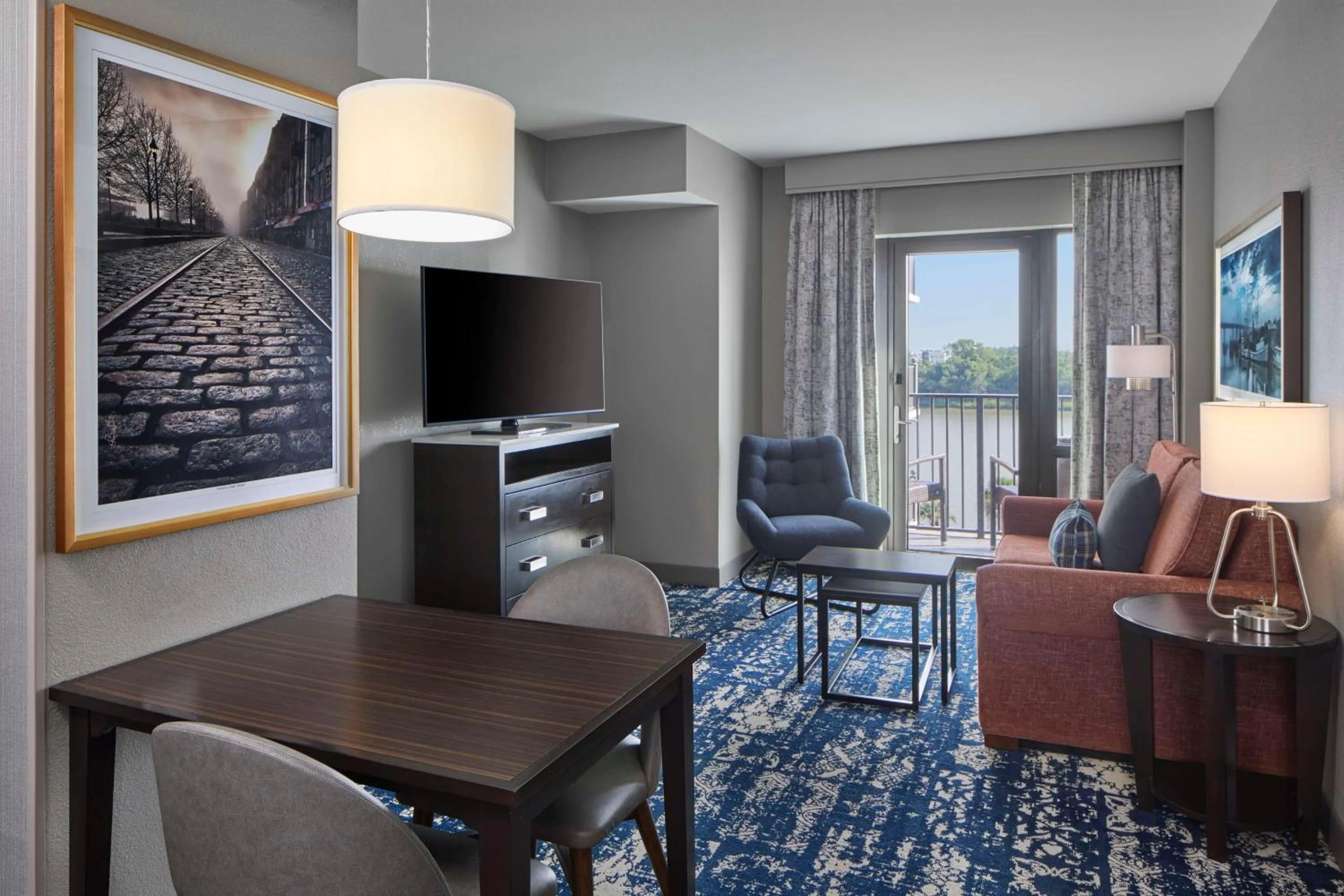King Suite with Balcony and River View in Homewood Suites Savannah Historic District/Riverfront
