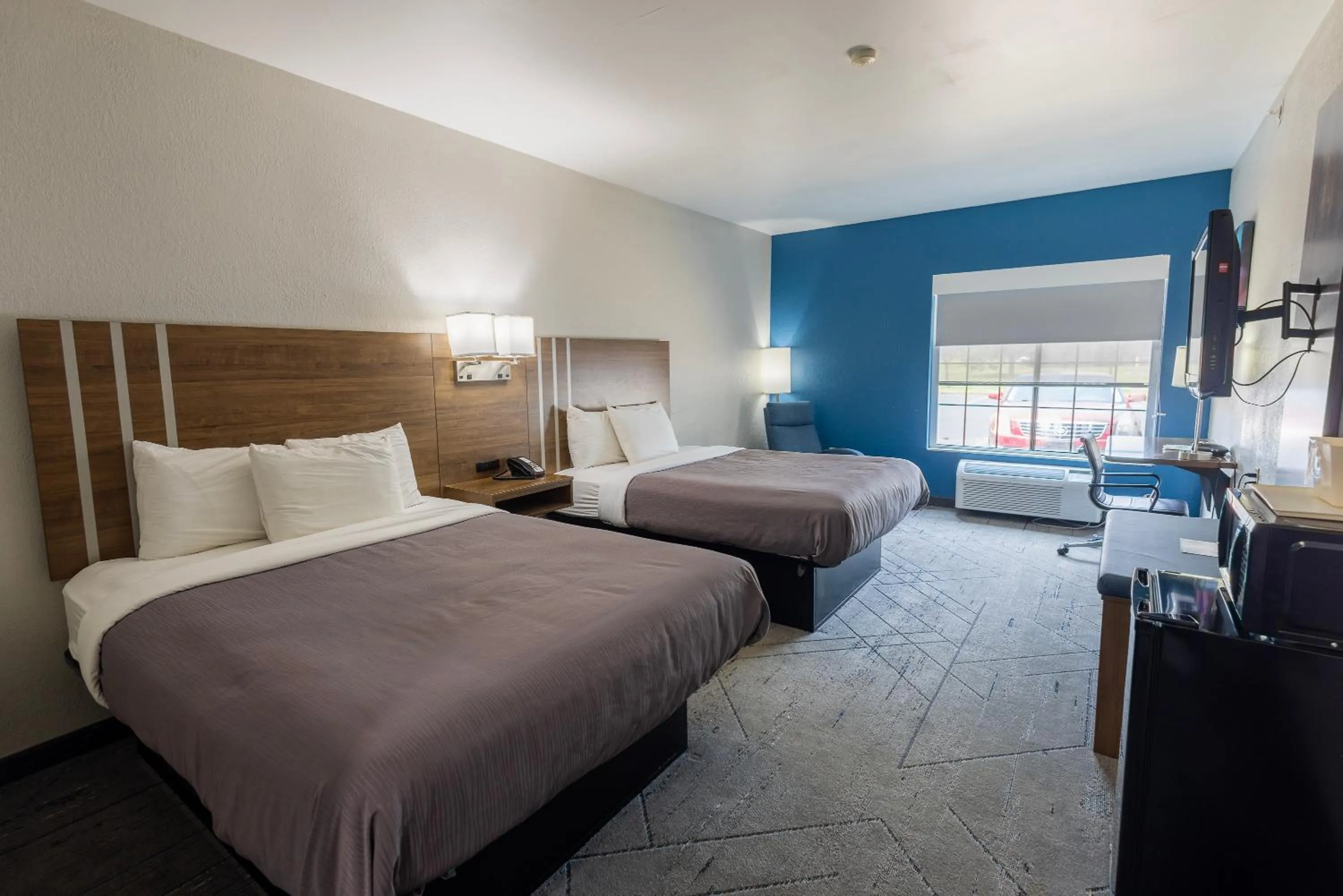 Queen Room with Two Queen Beds - Pet Friendly in Countryside Inn and Suites