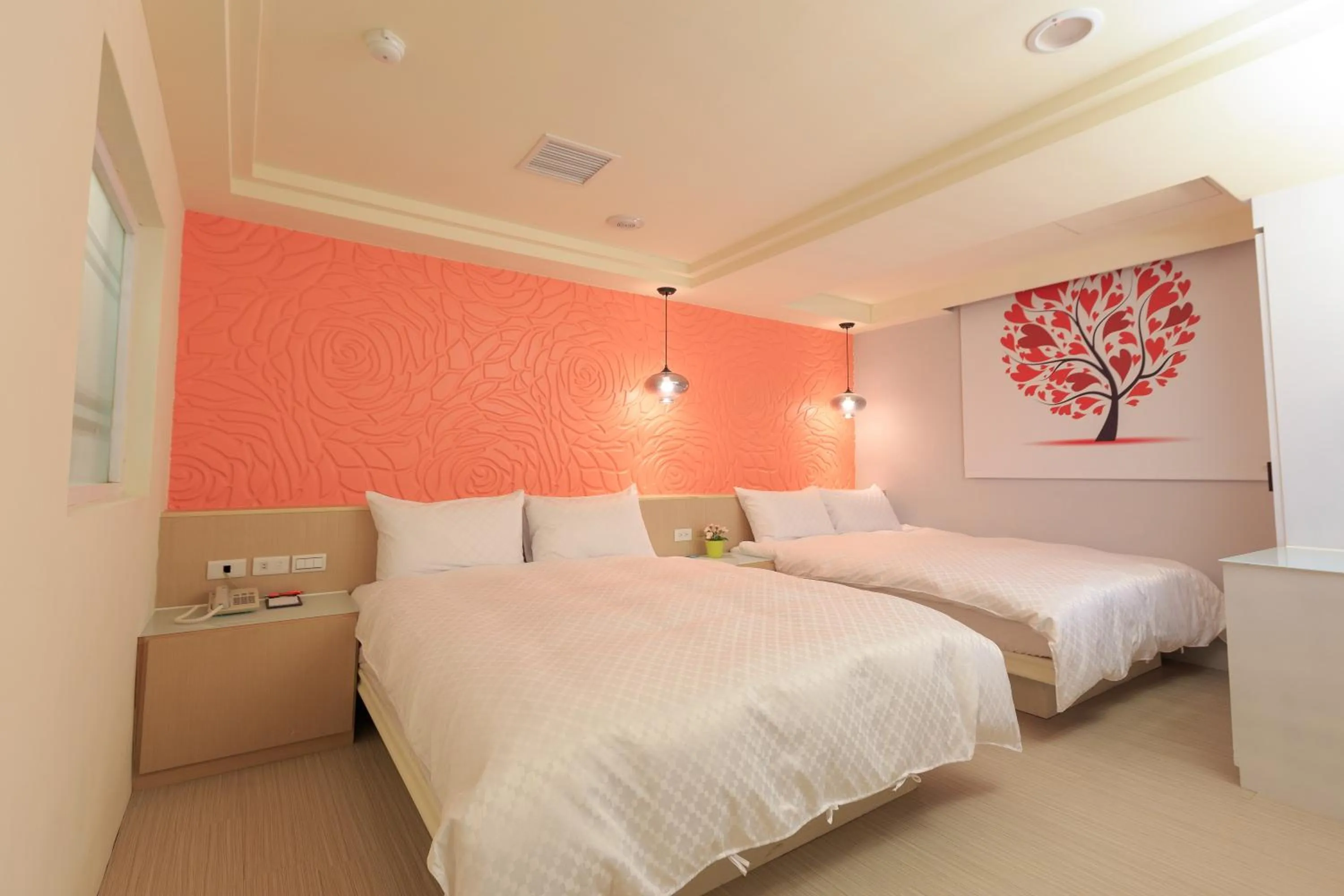 Luxury Quadruple Room in Travelyoung Hotel