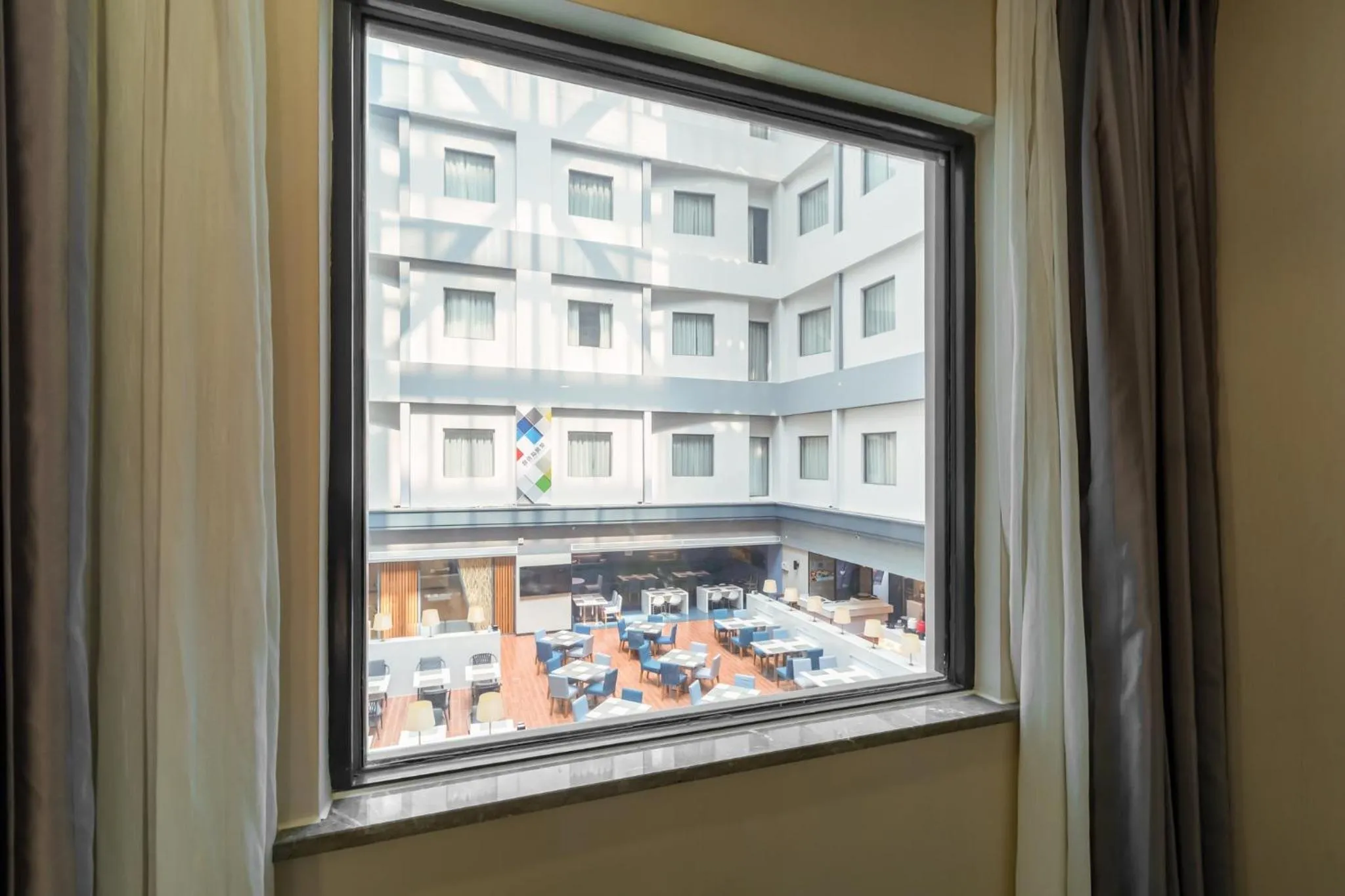 Queen Room with Atrium View in Holiday Inn Express Shenyang North Station, an IHG Hotel