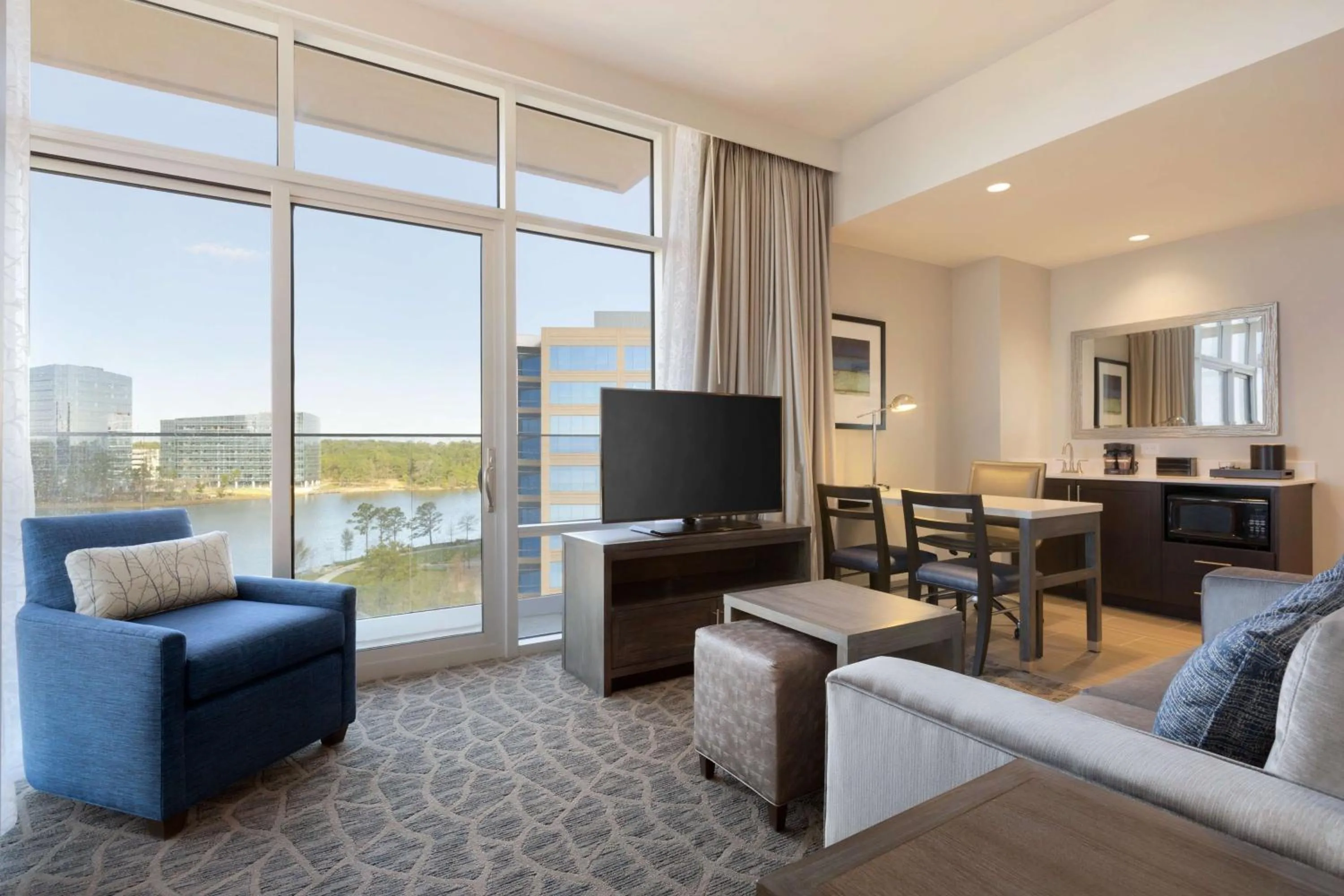 Two Room King Suite with Balcony and Lake View in Embassy Suites by Hilton The Woodlands