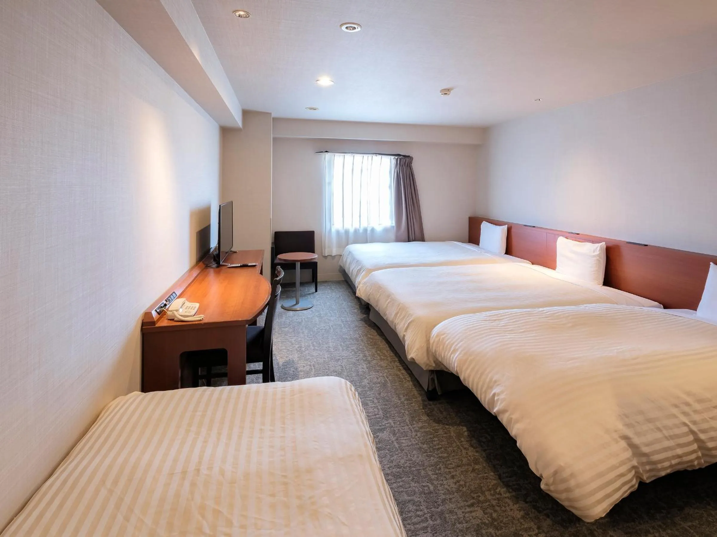 Comfort Twin Room with 2 Extra Beds - Non-Smoking in Vessel Hotel Miyakonojo
