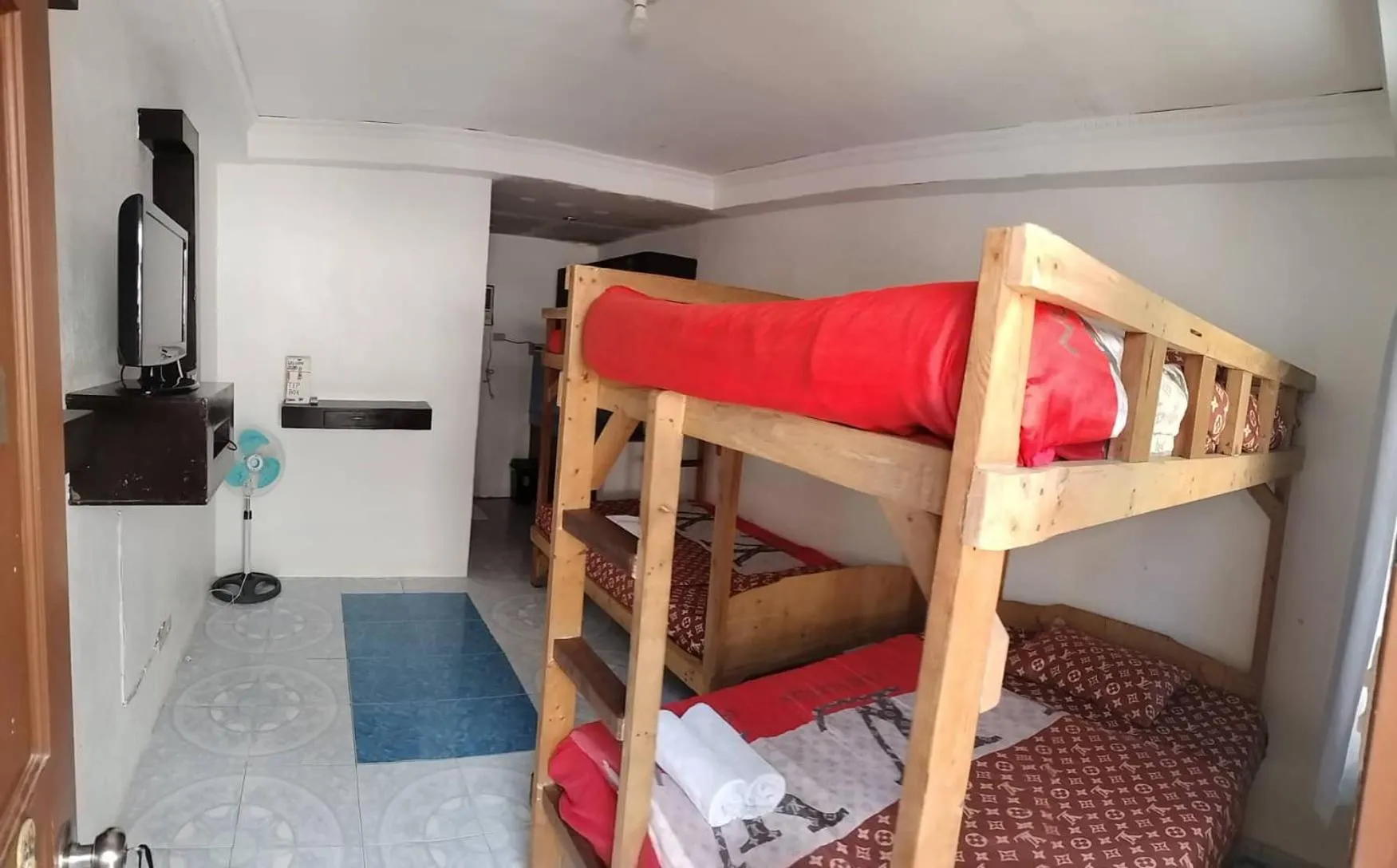 Classic Quadruple Room in Lola's Lodge