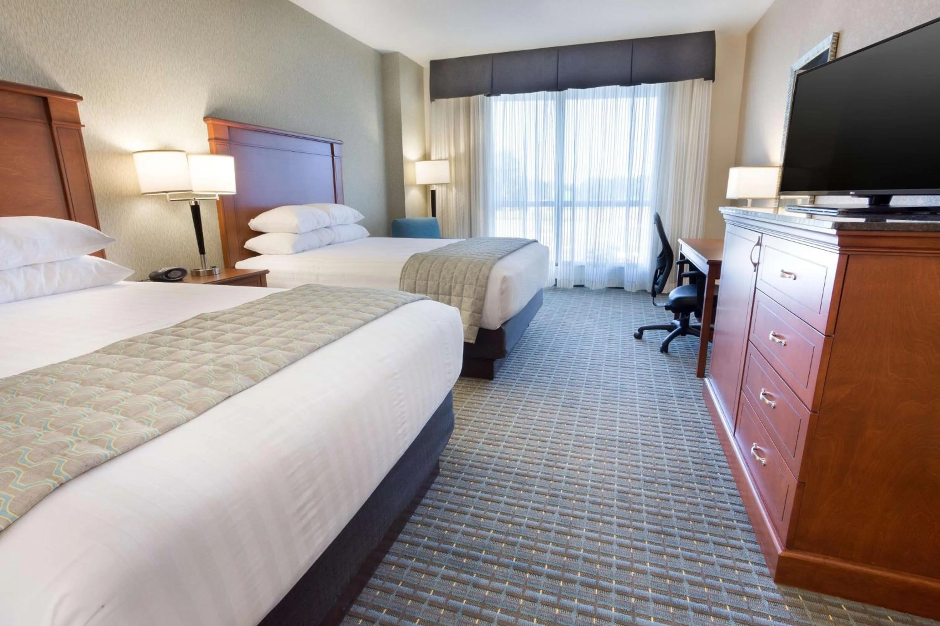 Deluxe Queen Room with Two Queen Beds - Hearing Accessible in Drury Inn & Suites Burlington