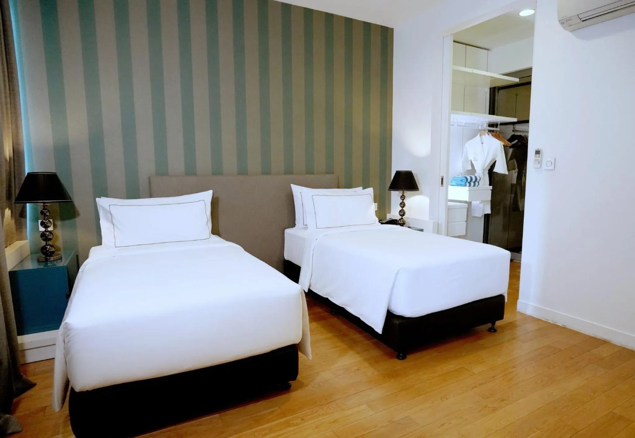 One Bedroom Deluxe Twin in THE FACE Suites Hotel