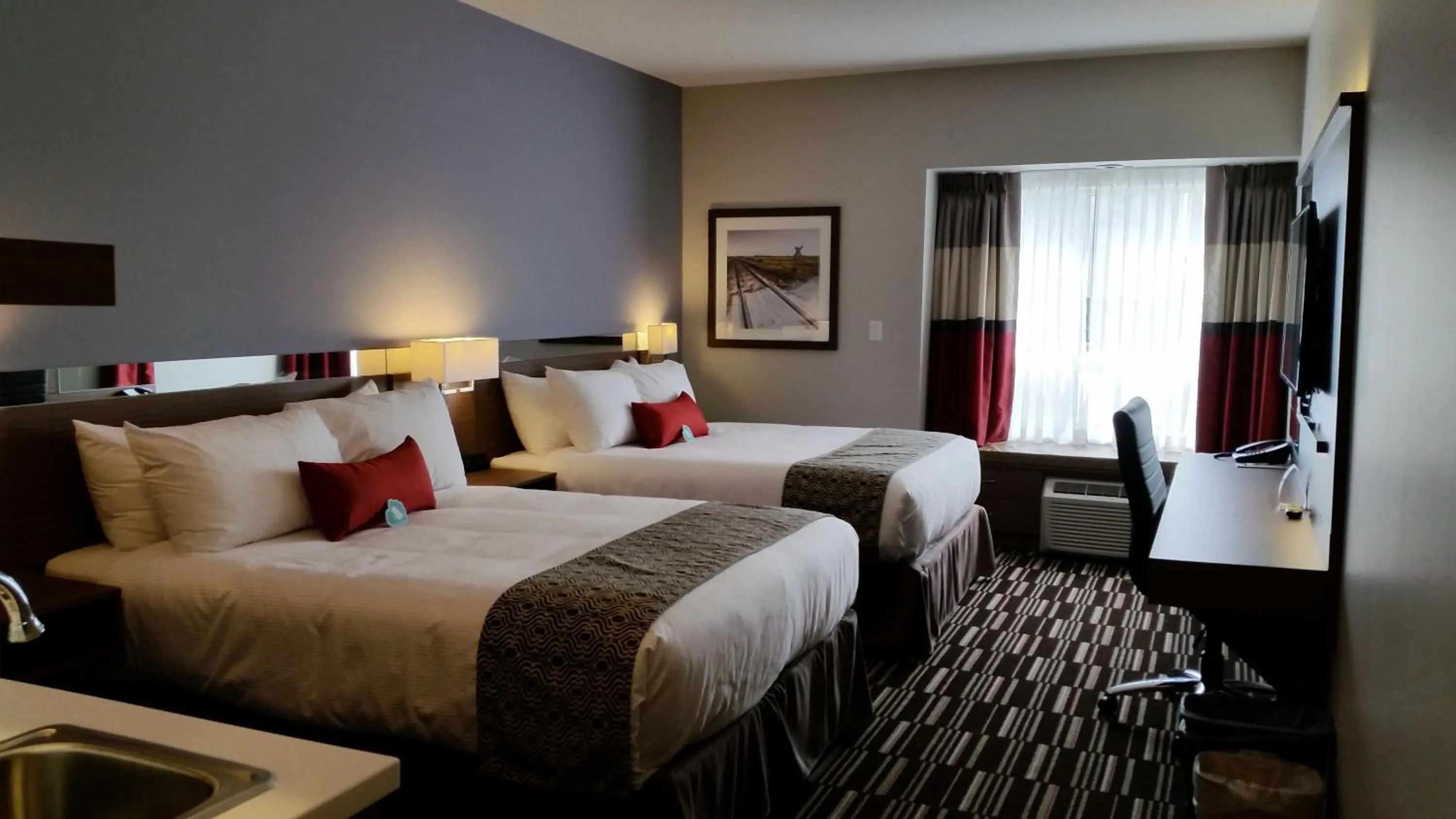 Deluxe Queen Room with Two Queen Beds - Non-Smoking in Microtel Inn & Suites by Wyndham Bonnyville