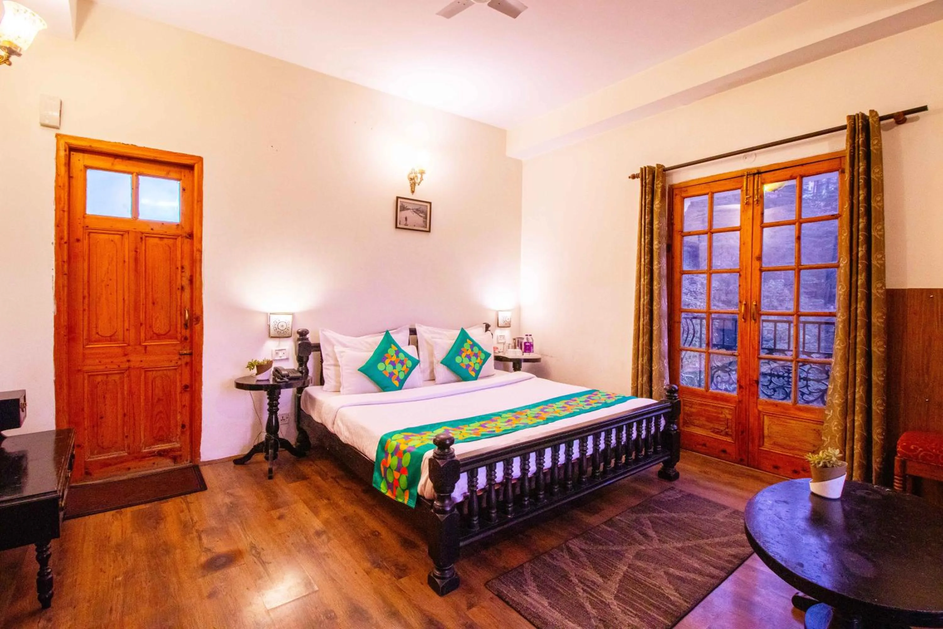 Deluxe Room with Balcony & Mountain View in Treebo The Alpine Heritage Residency