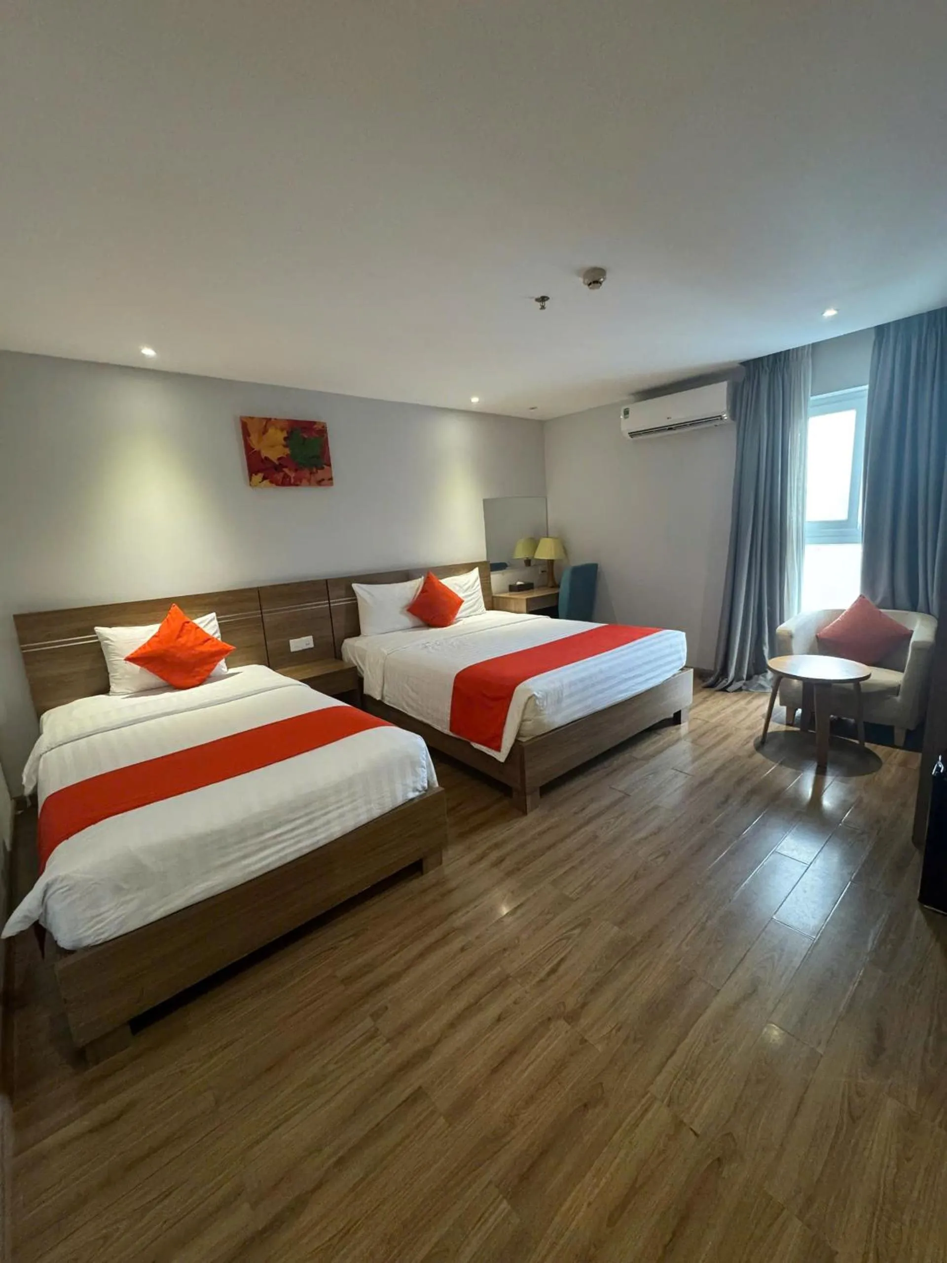 Deluxe Queen Room with Two Queen Beds in Maple Leaf Hotel & Apartment