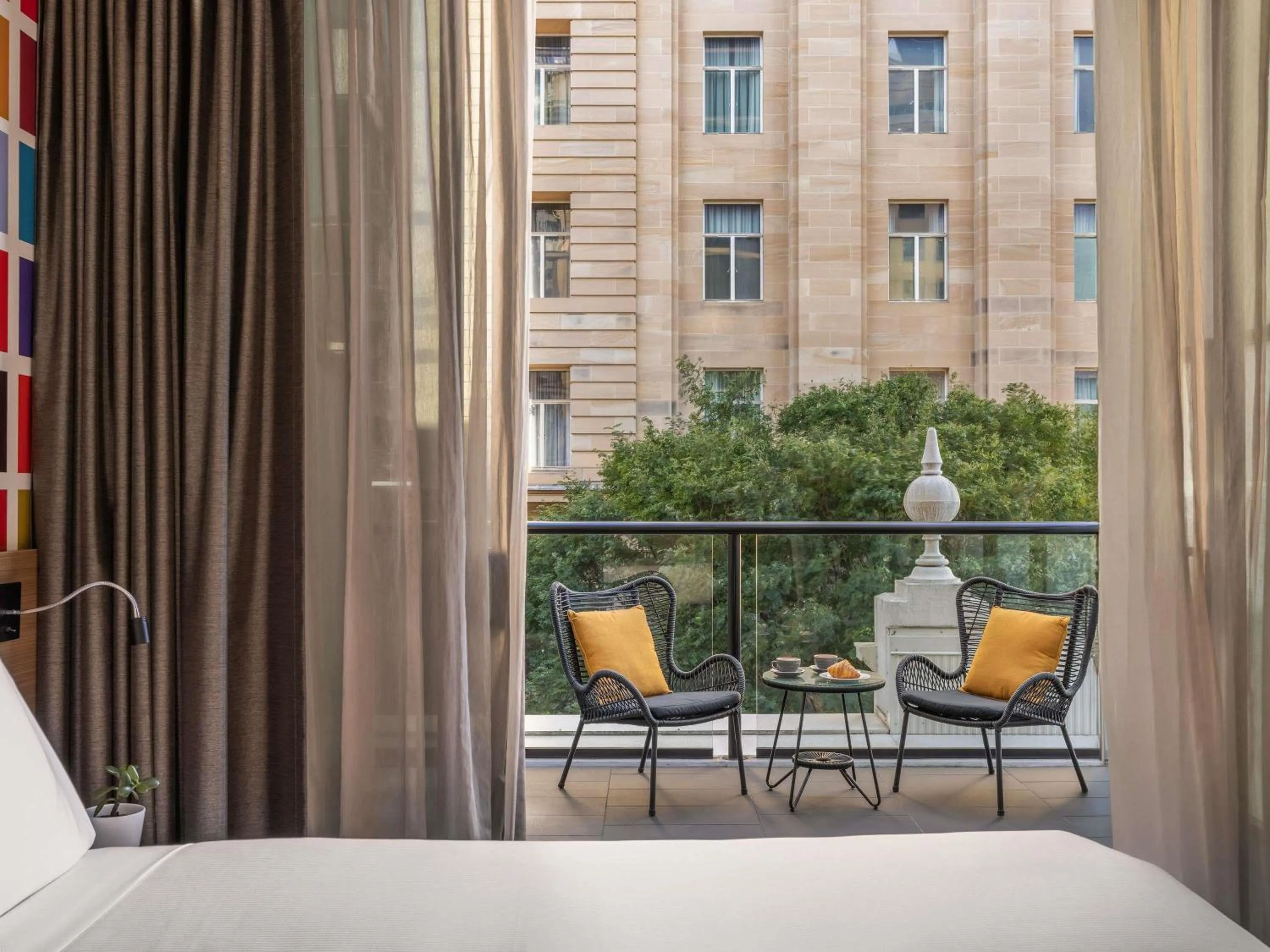 Standard King Room with Balcony in ibis Styles Brisbane Elizabeth Street