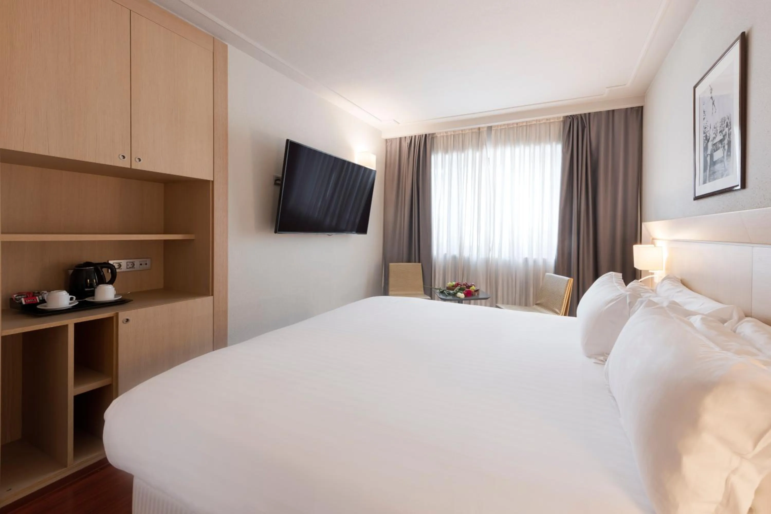 Deluxe Room in Suites Plaza Hotel & Wellness
