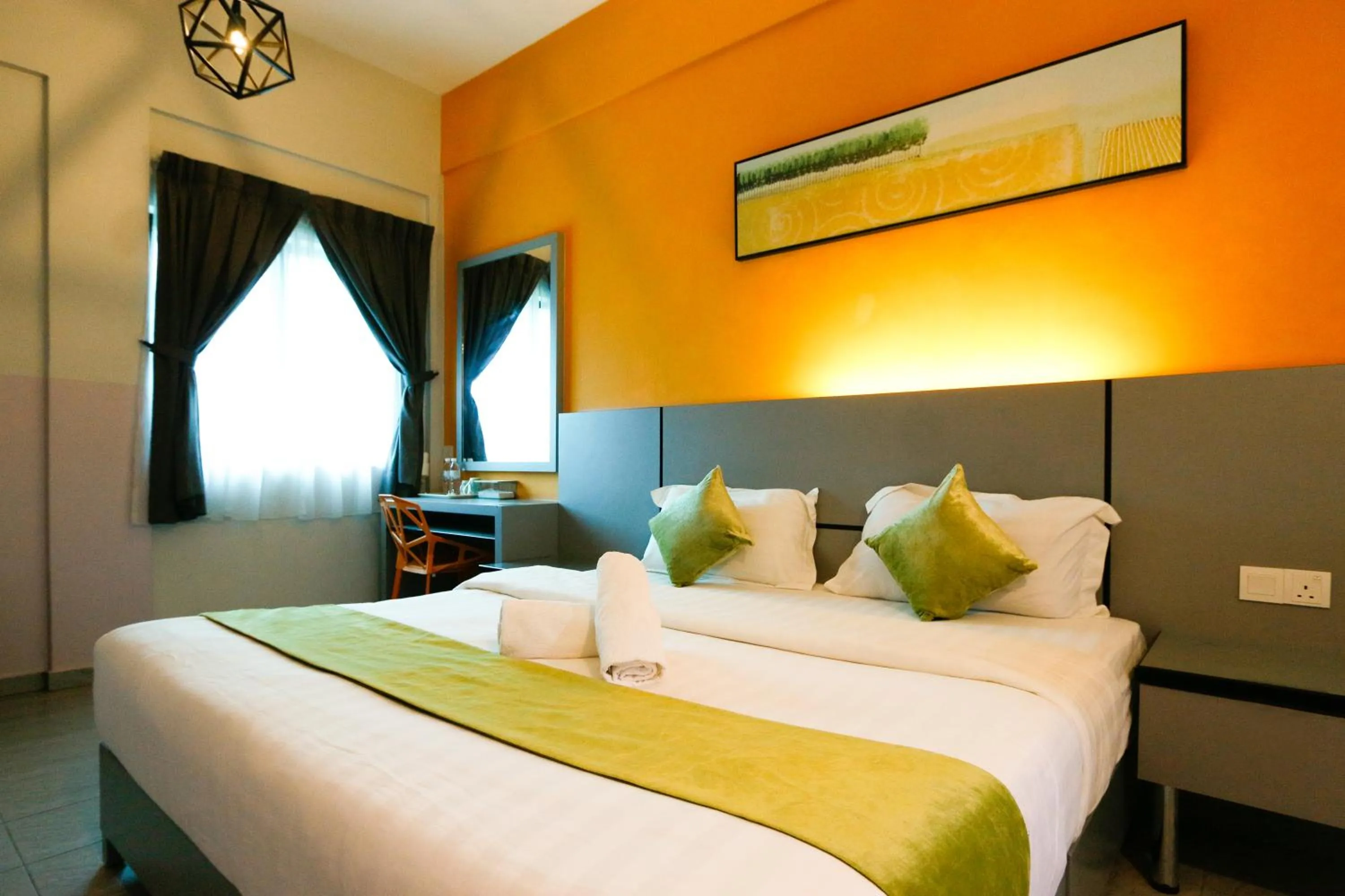 Deluxe King Room in Travelland Hotel