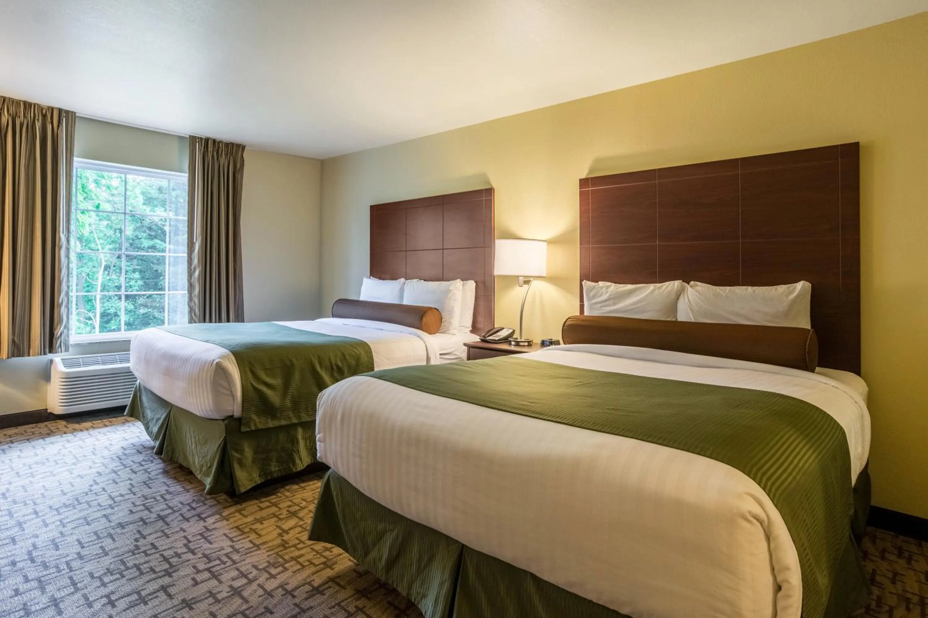 Deluxe Queen Room in Cobblestone Hotel & Suites - Harborcreek