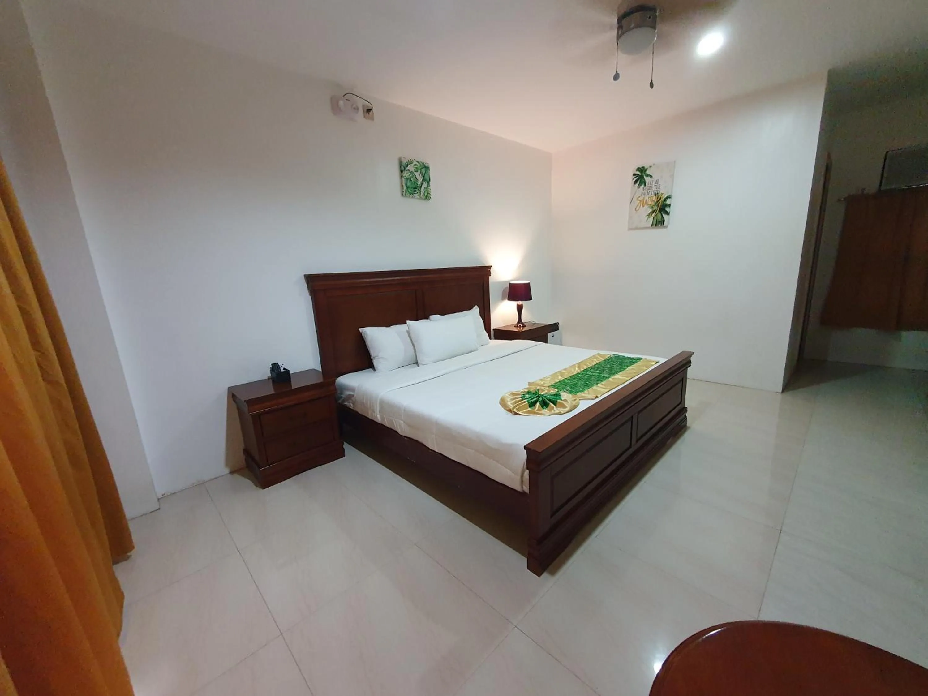 Queen Room with Pool View in Moalboal Tropics