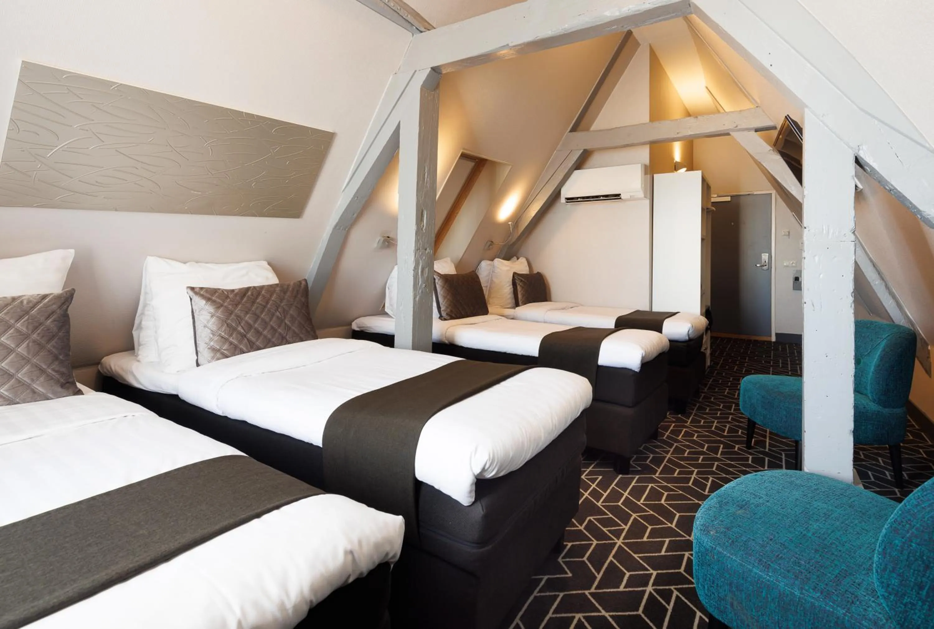 Attic Quadruple Room in Hotel CC