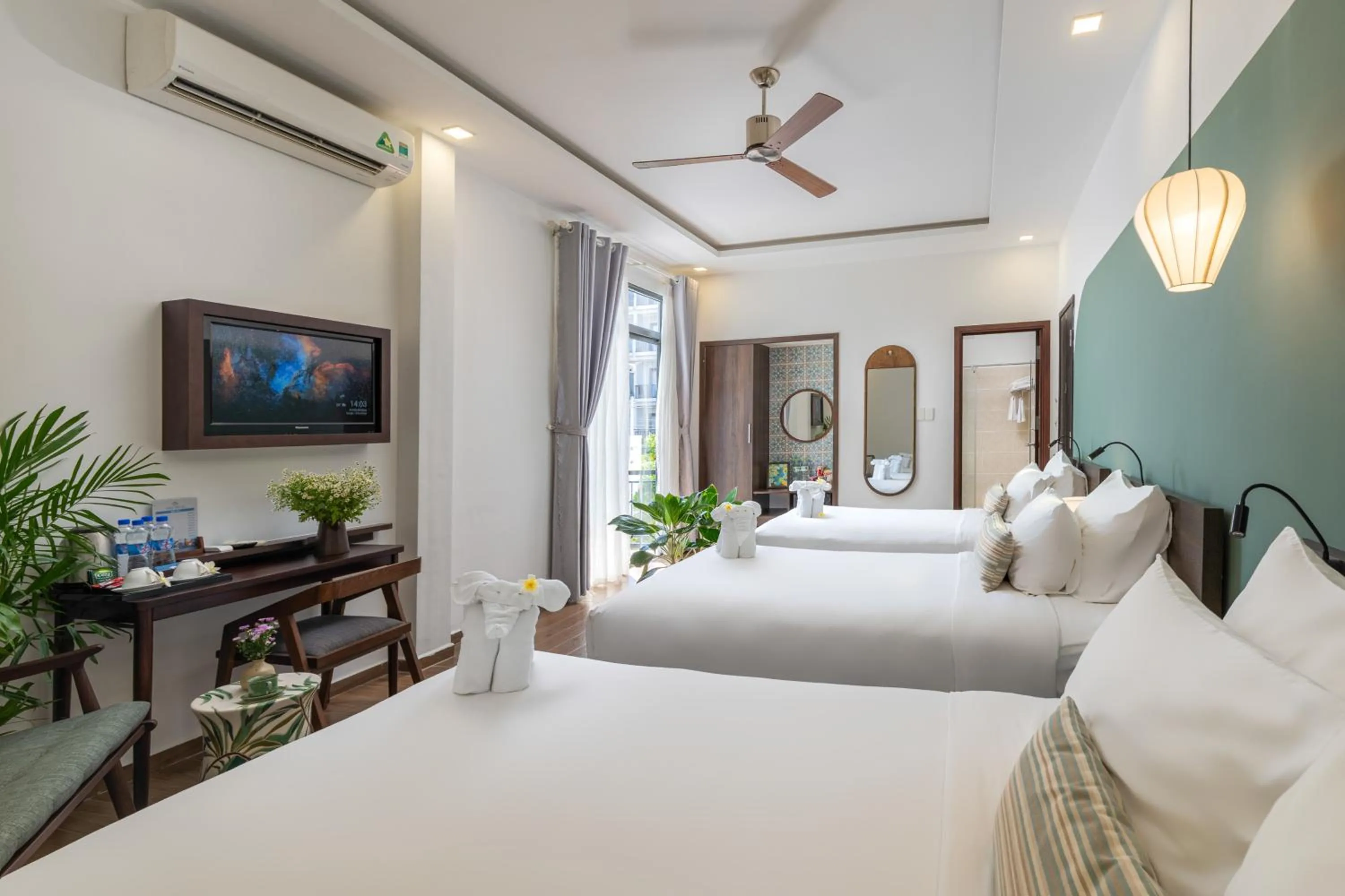 Deluxe Quadruple Room with Balcony in Volar Hoi An