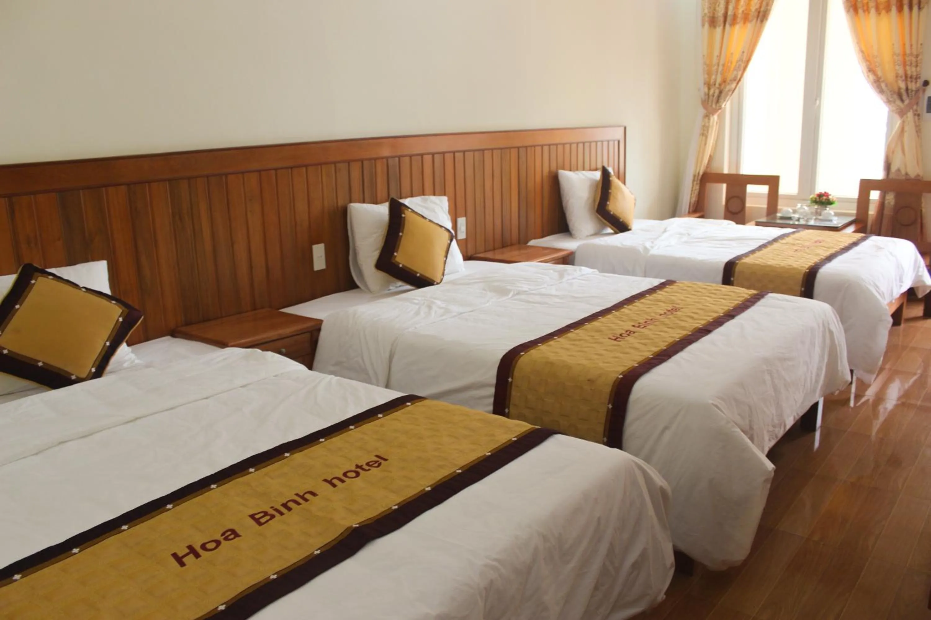Deluxe Triple Room in Hoa Binh Hotel