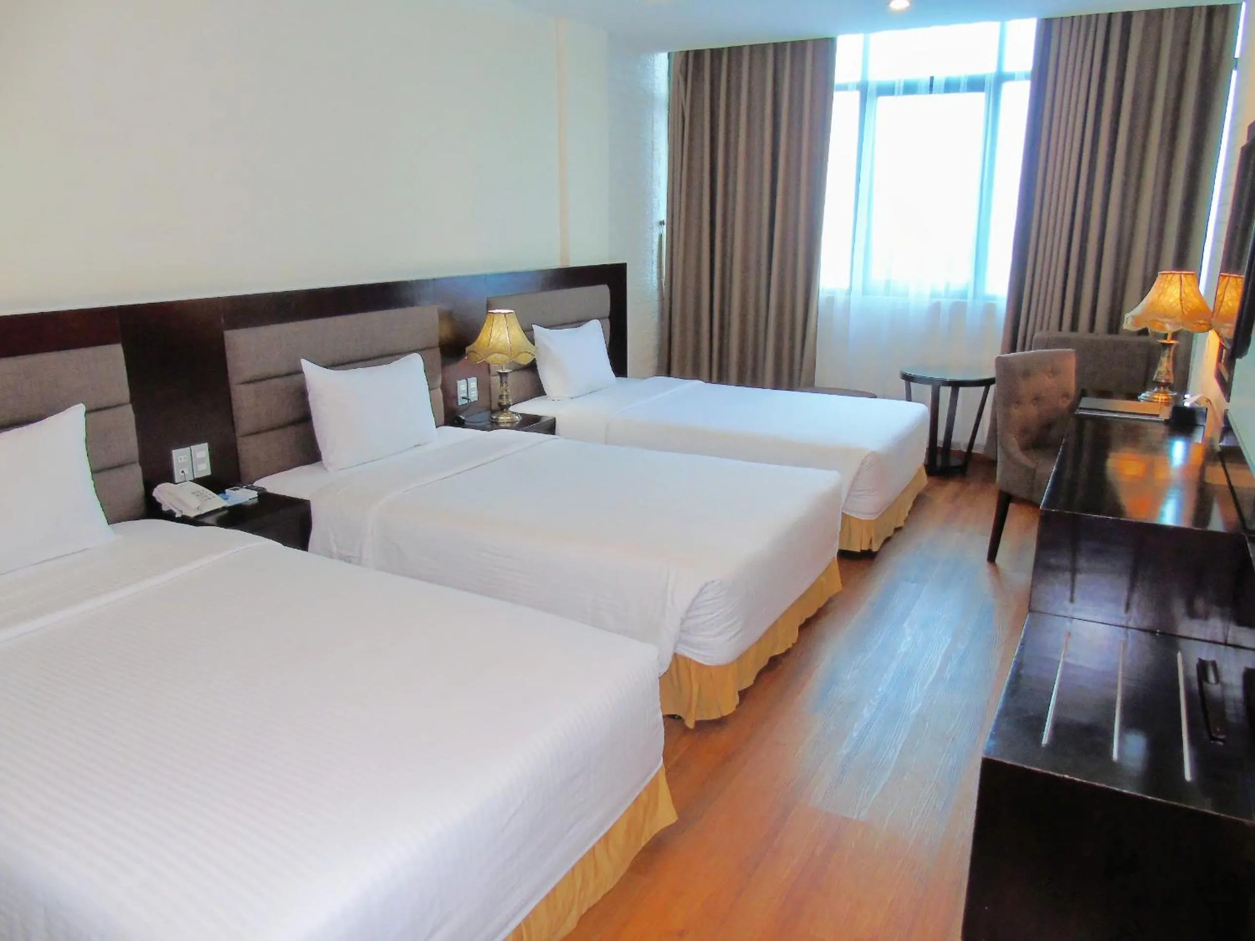 Deluxe Triple Room in Muong Thanh Vinh Hotel
