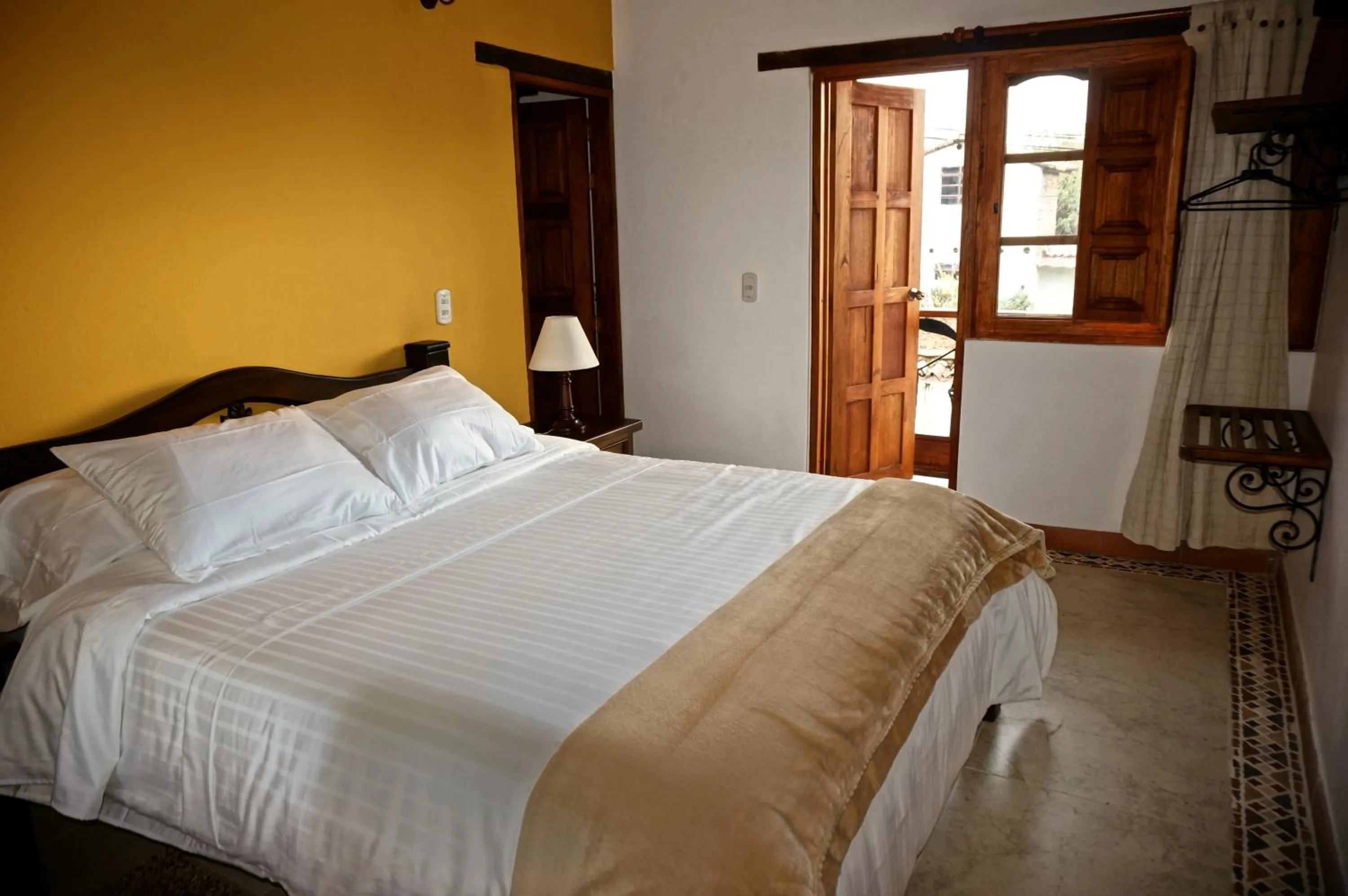 Queen Room with Balcony in Hotel Jardines De La Villa