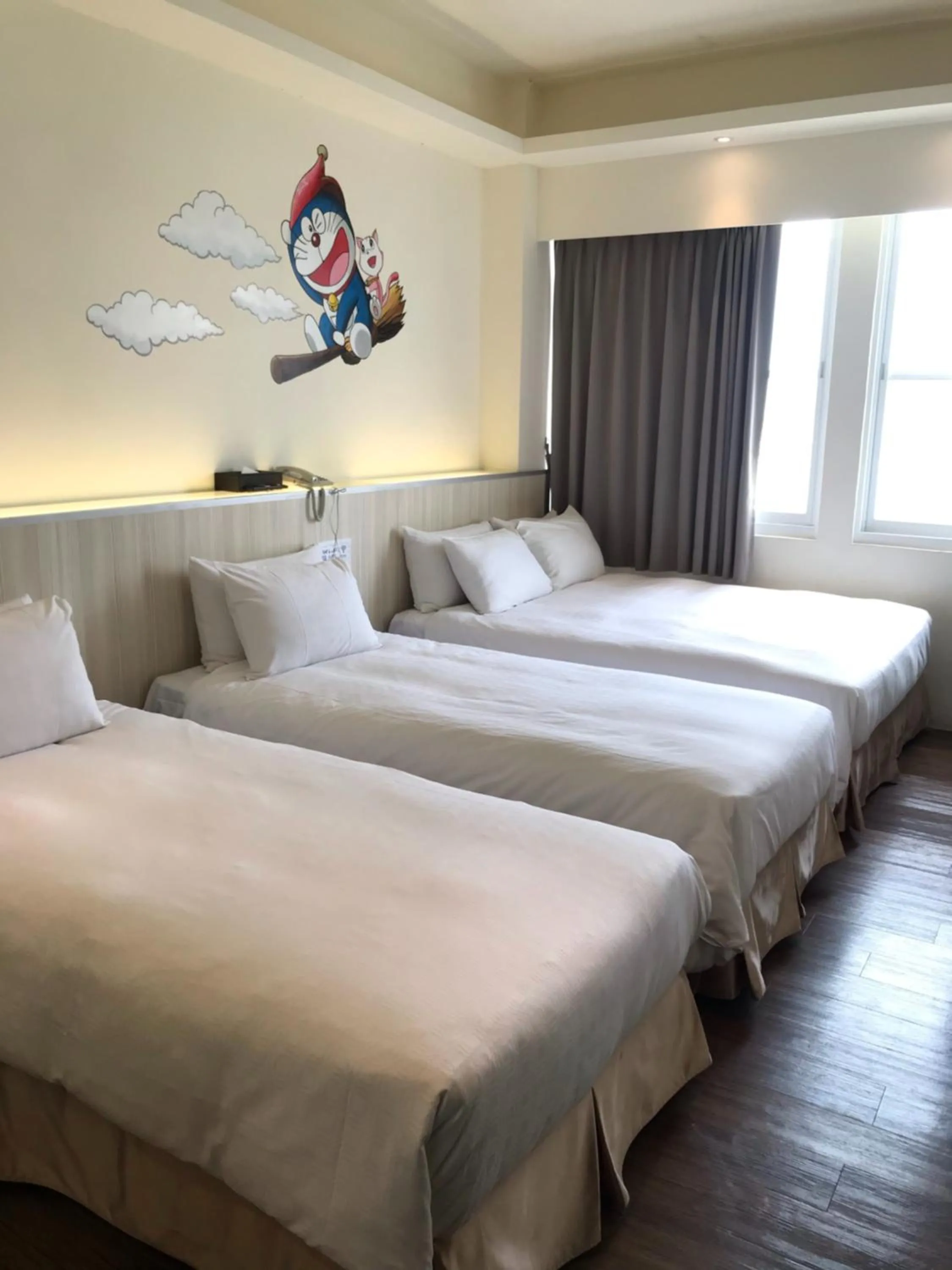 Deluxe Triple Room in M Hotel