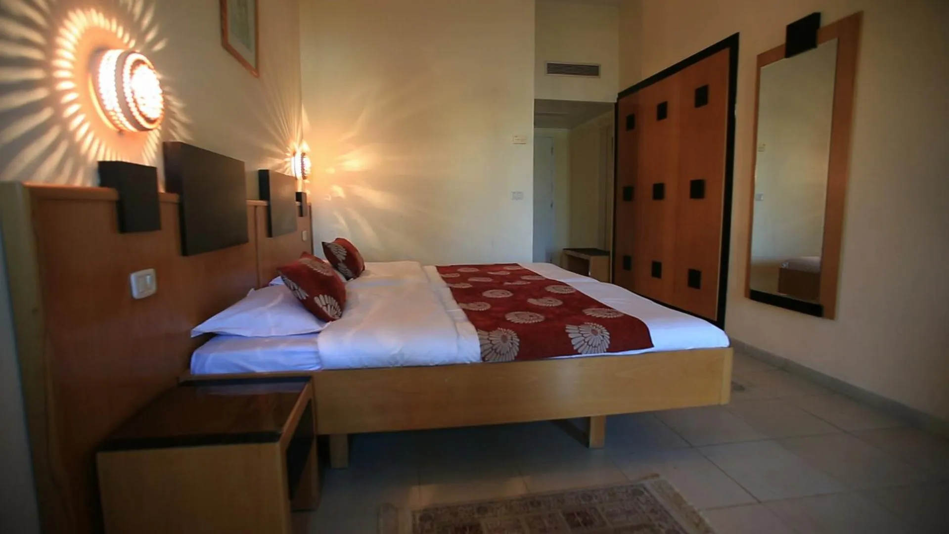 Standard Quadruple Room in Hotel Les Palmiers