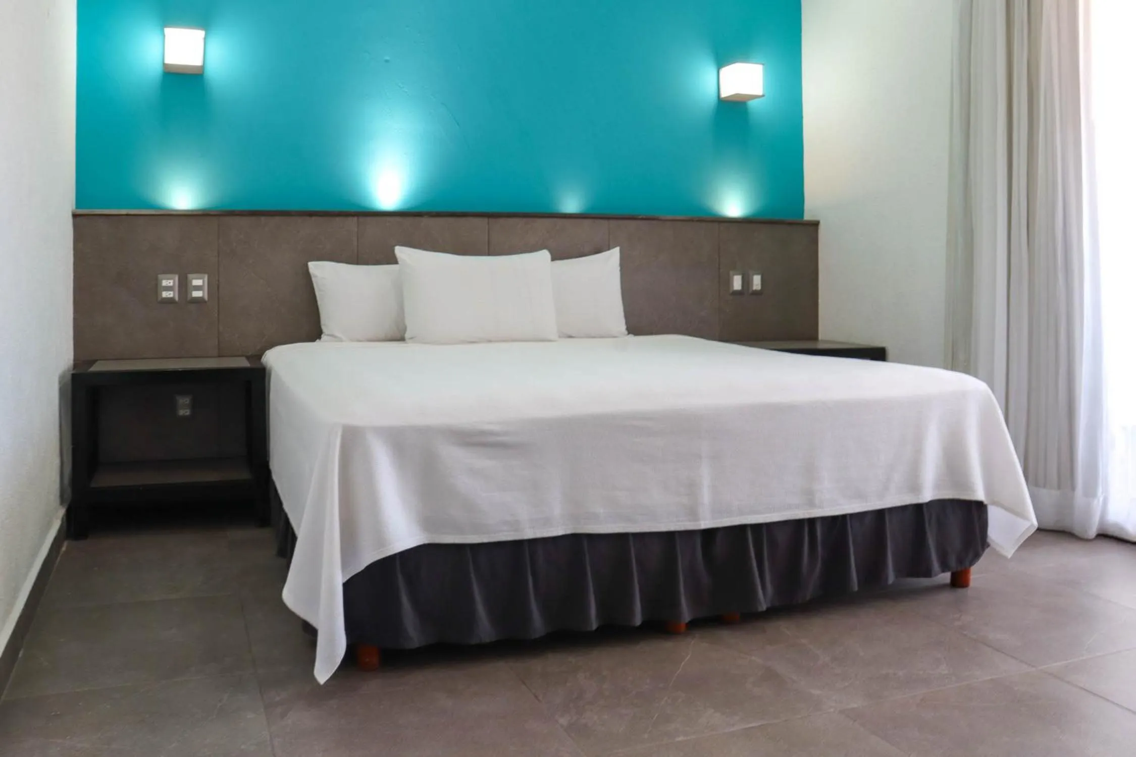 Deluxe King Suite in Hotel MX portal maya