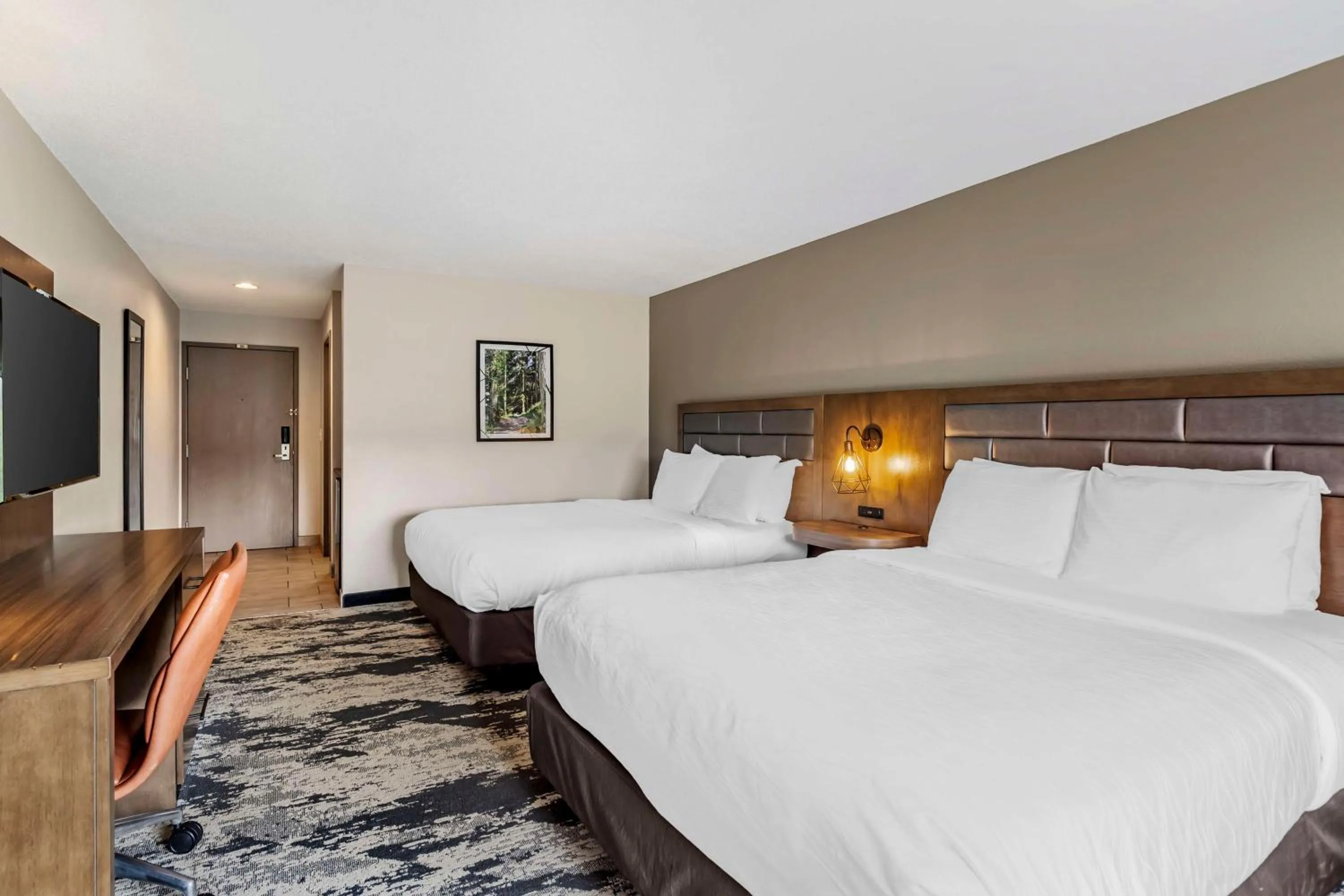 Queen Room with Two Queen Beds and Mobility Accessible Bathtub in Best Western Plus Bourbonnais Hotel & Suites