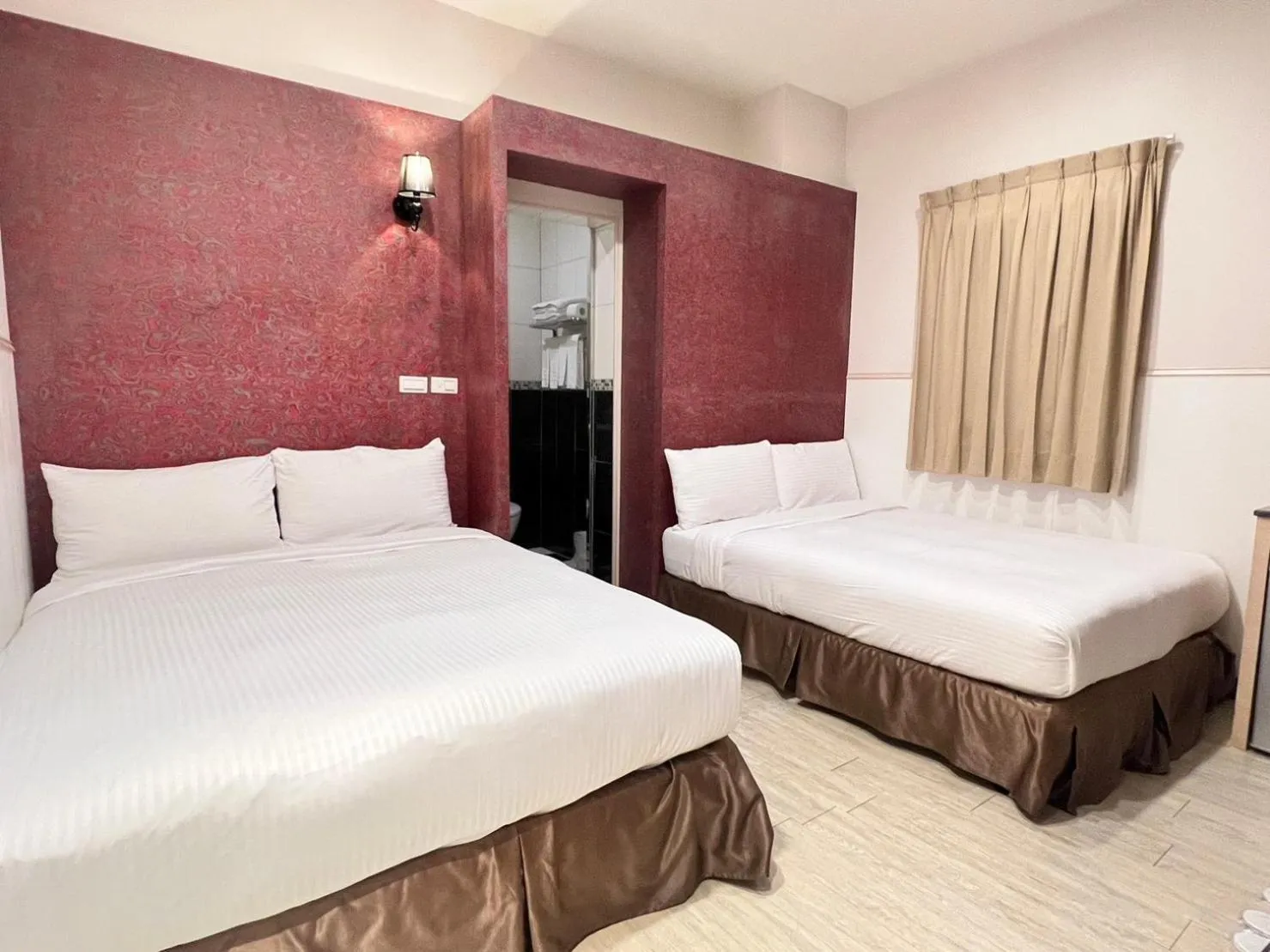 Standard Quadruple Room in Kaishen Hotel