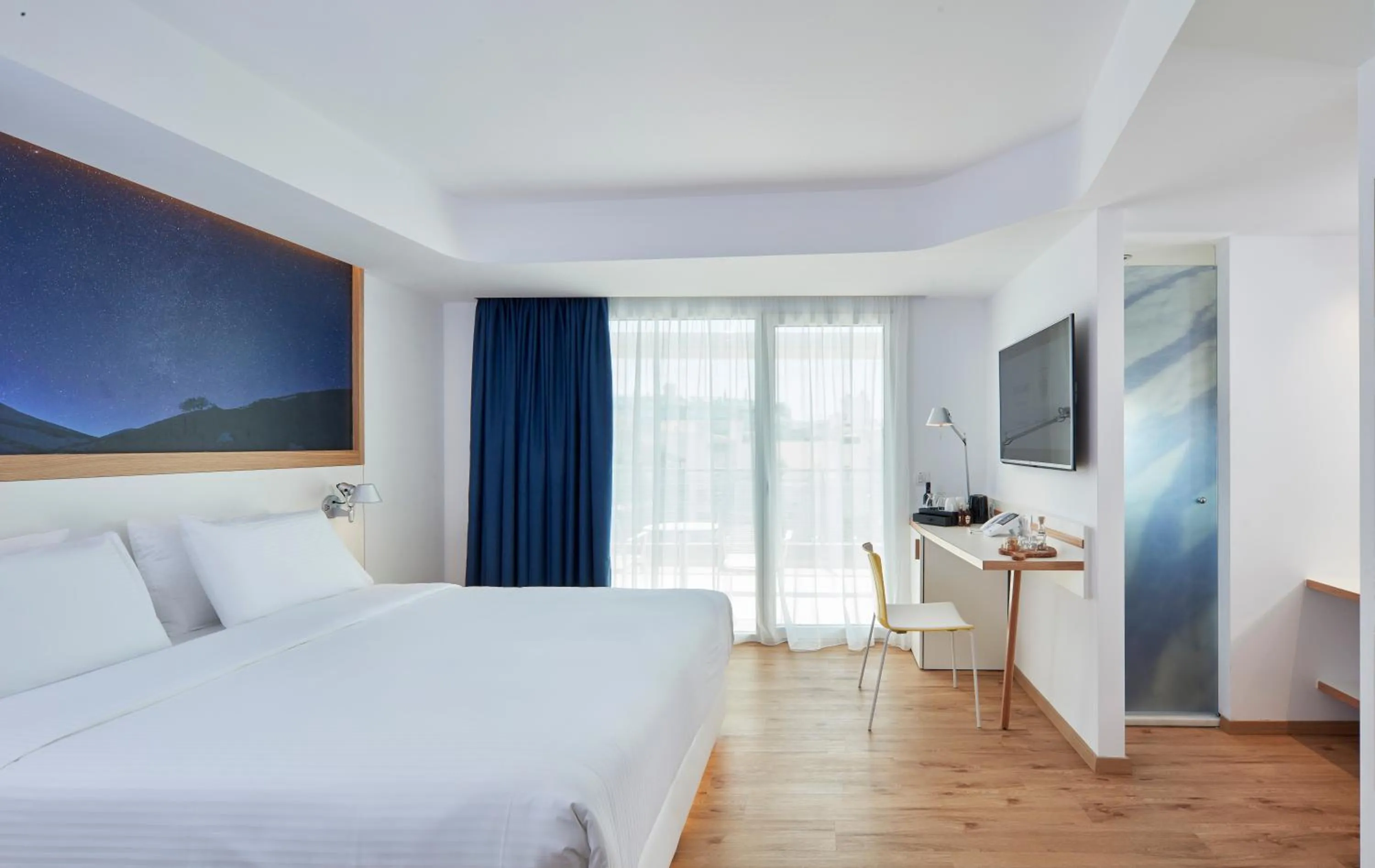 Olive Green Club Elite Room in Olive Green Hotel