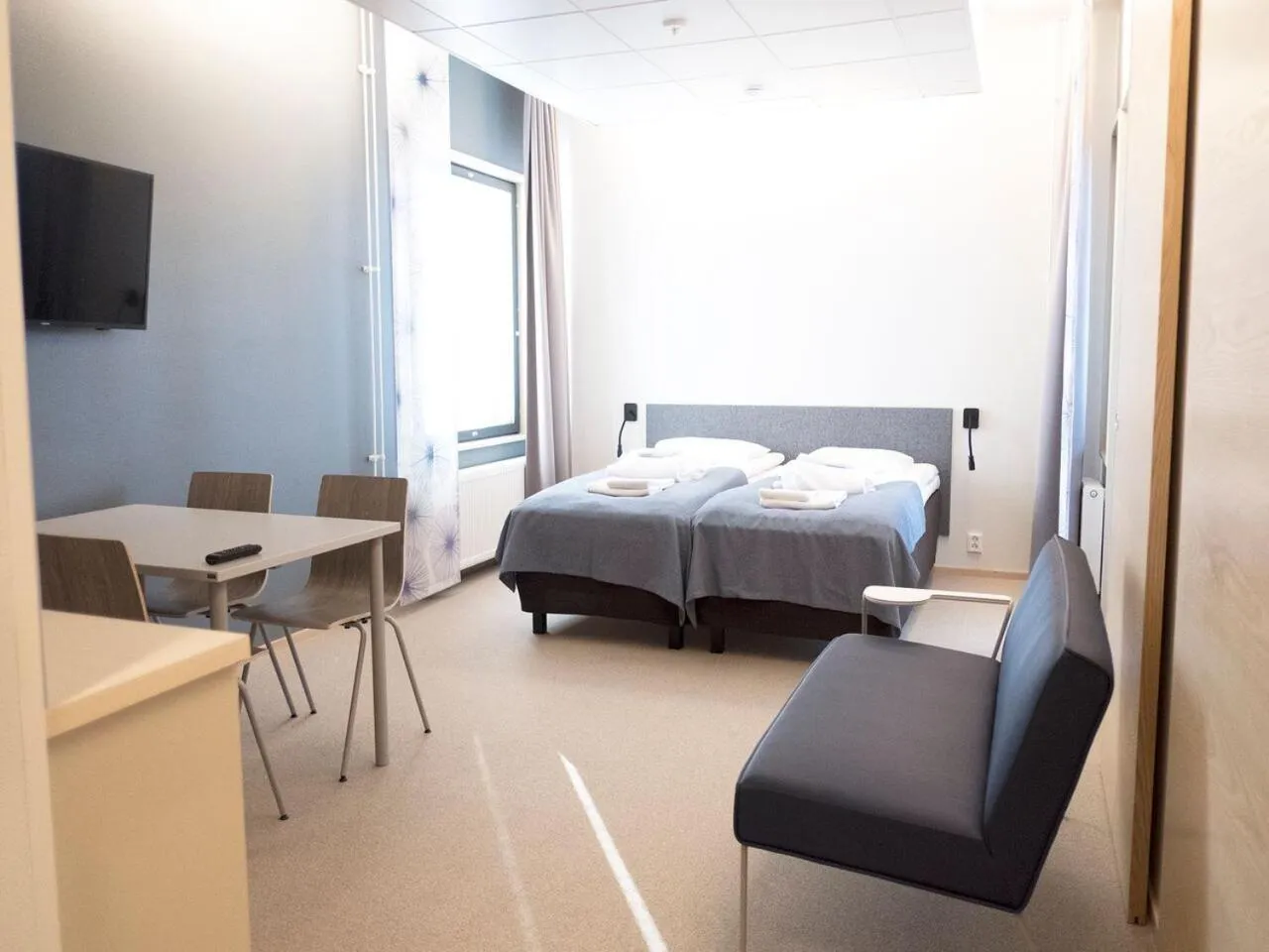 Superior Quadruple Room with Sauna in Santasport Resort