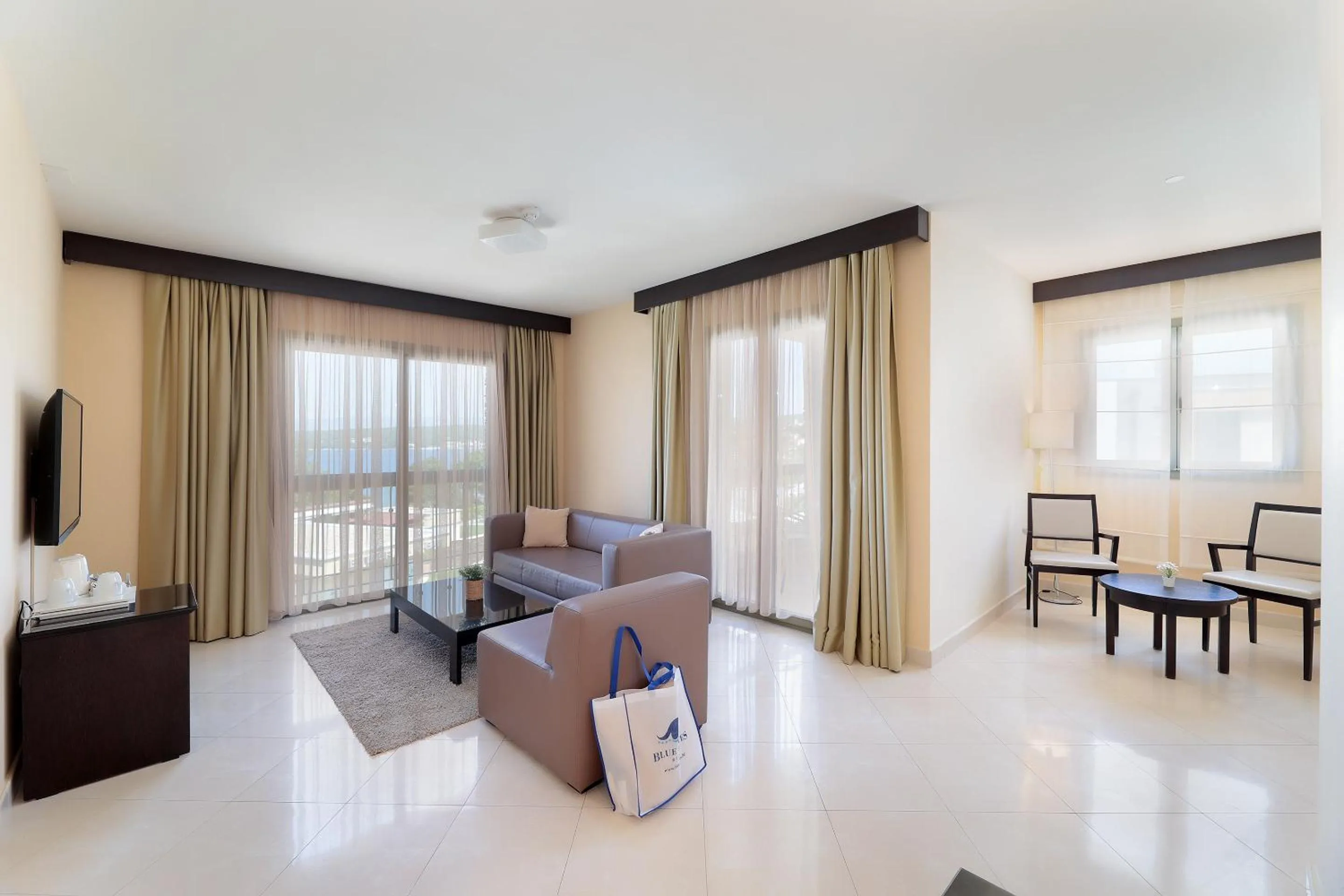 Family Suite (2 Adults + 2 Children) with Balcony in Blue Waves Resort