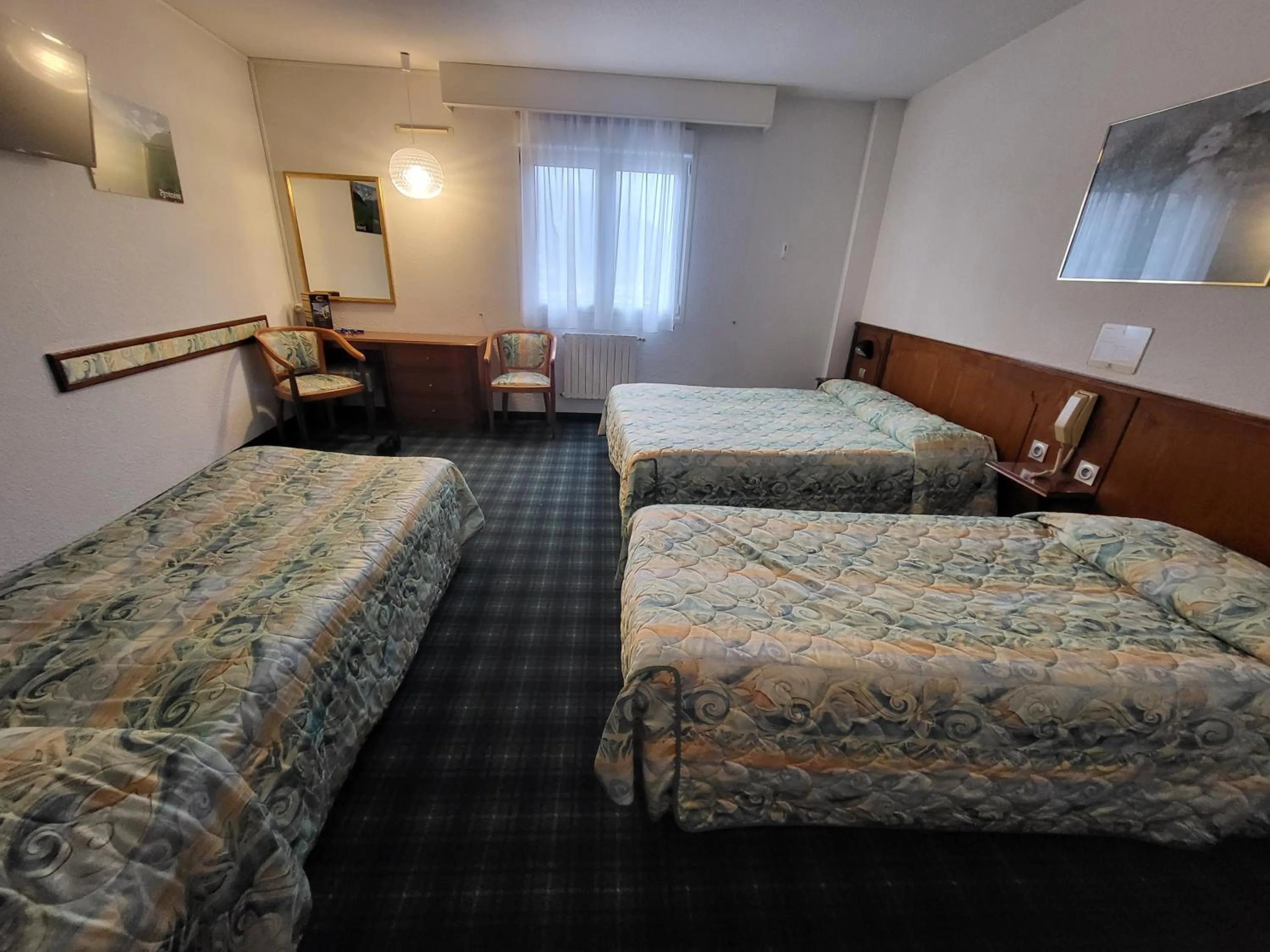 Classic Quadruple Room in Hôtel Christ Roi