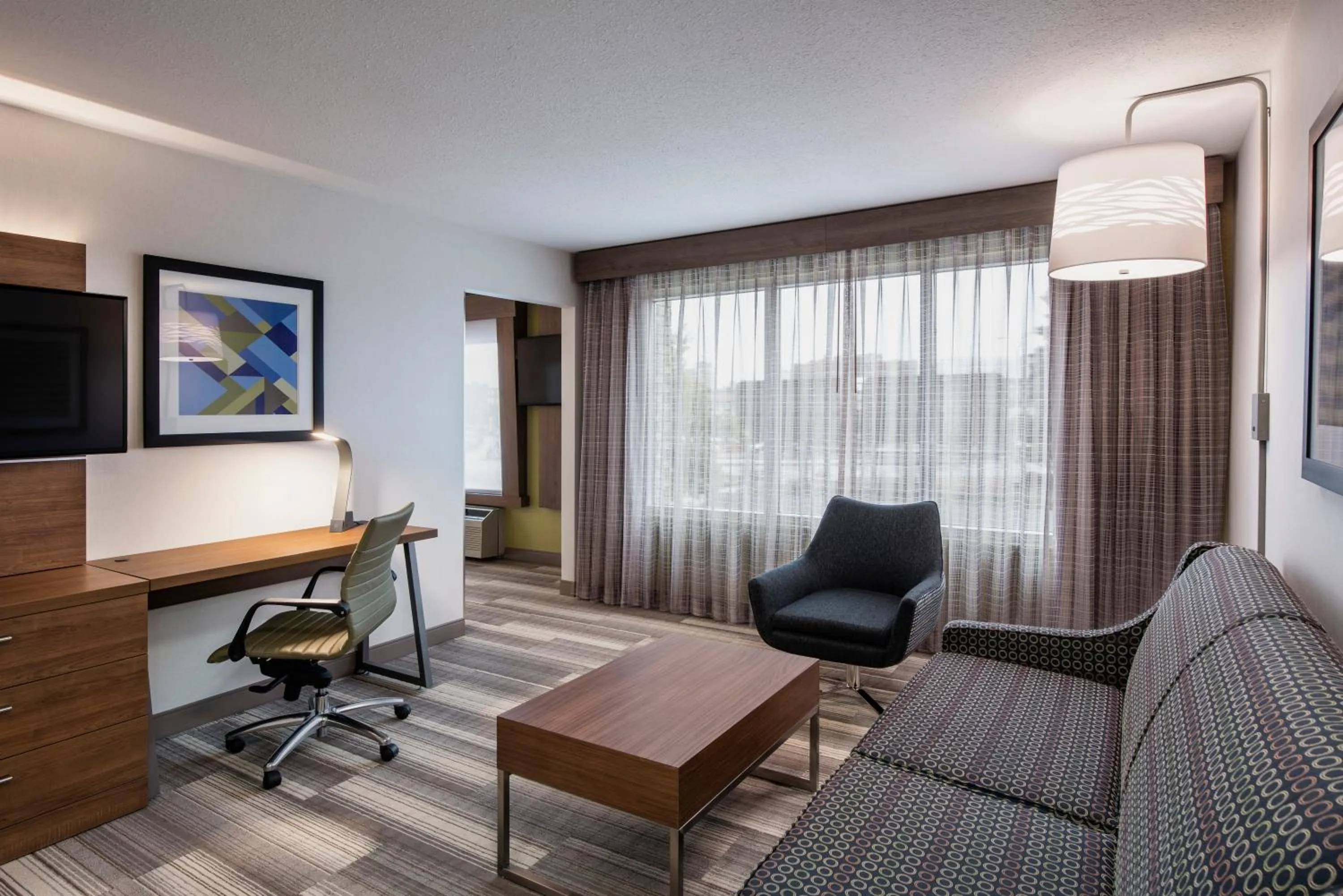 Seating area in Holiday Inn Express & Suites Saskatoon Centre by IHG