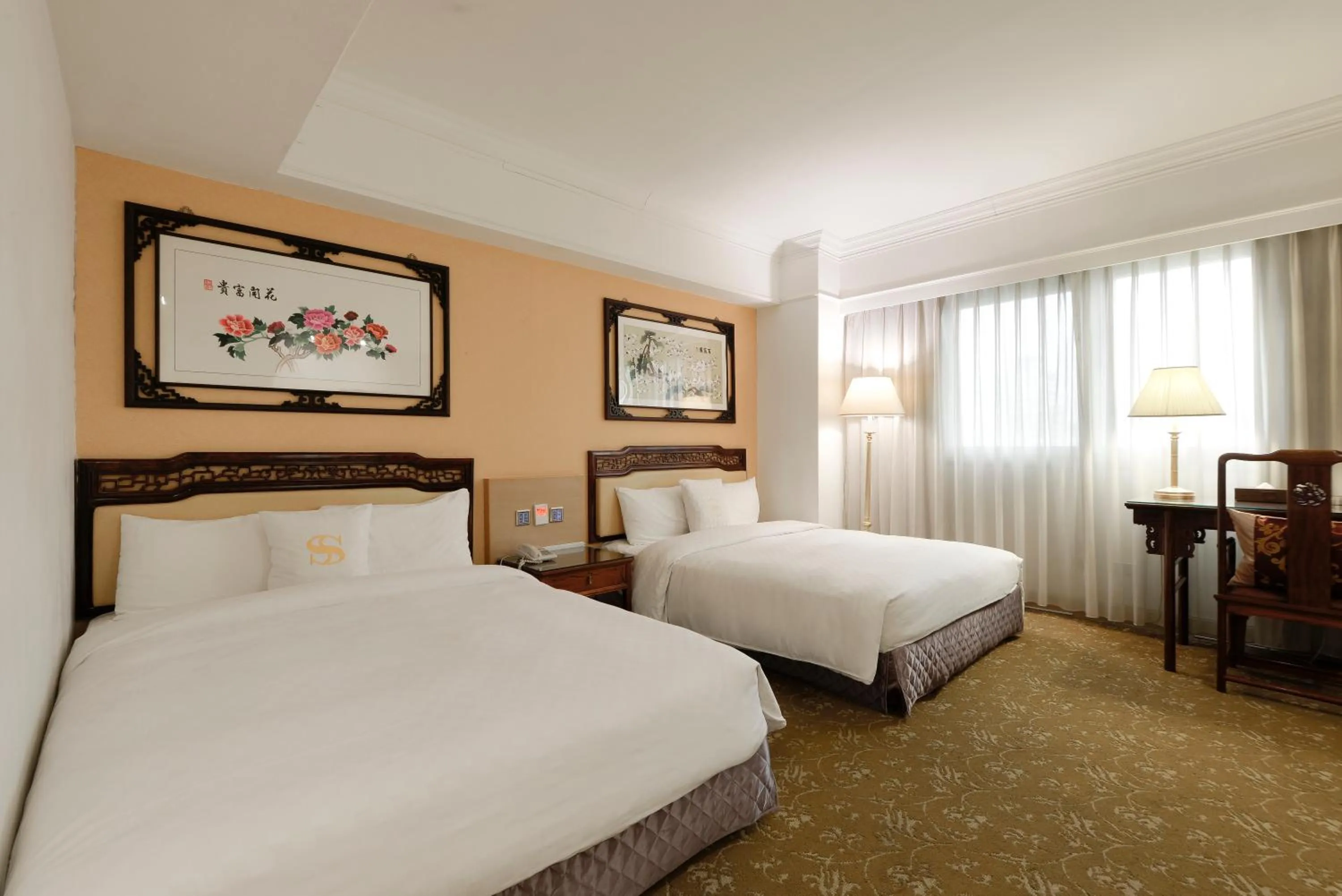 Deluxe Quadruple Room in Hotel Sunshine