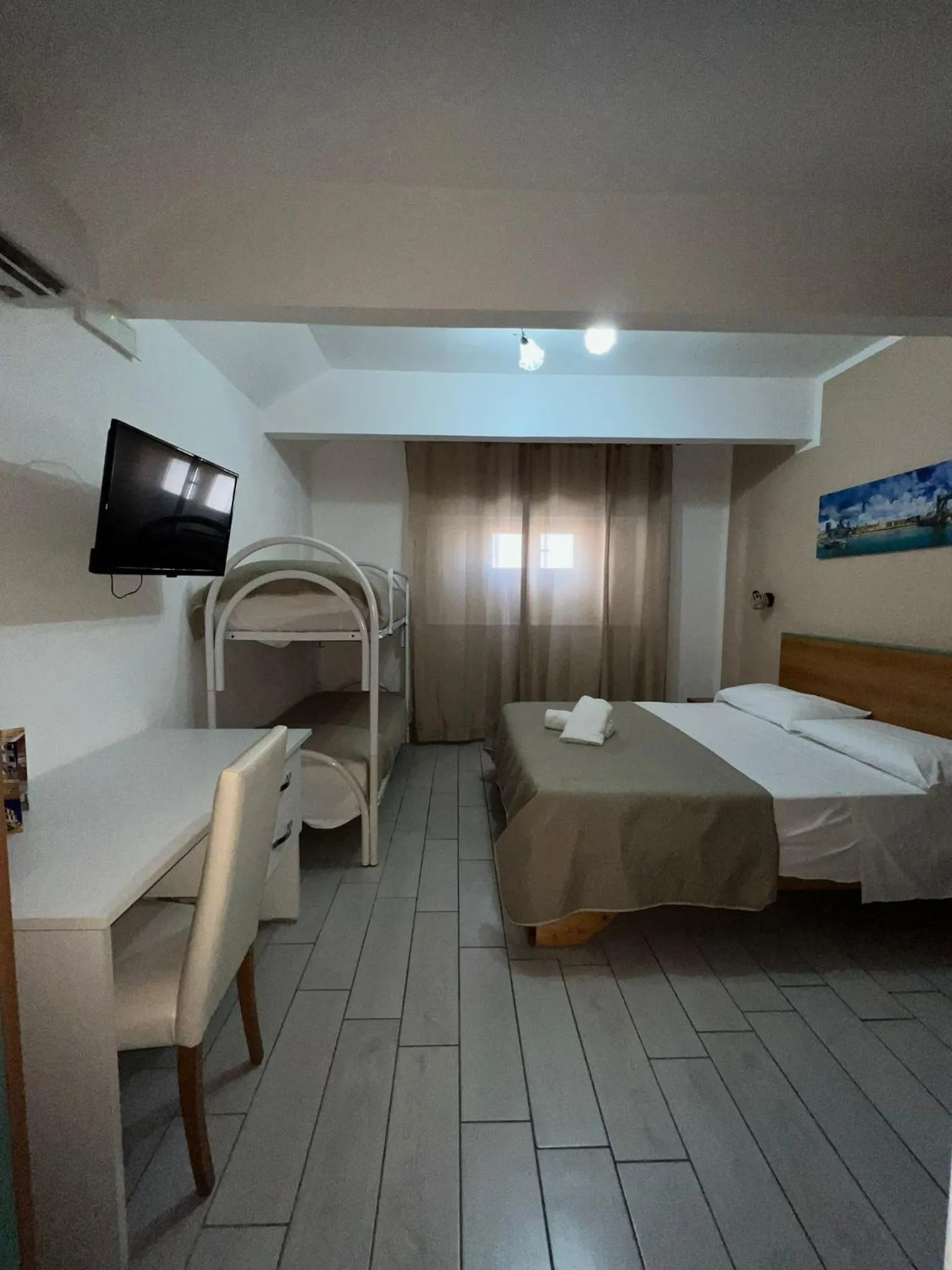 Quadruple Room in Hotel Martini