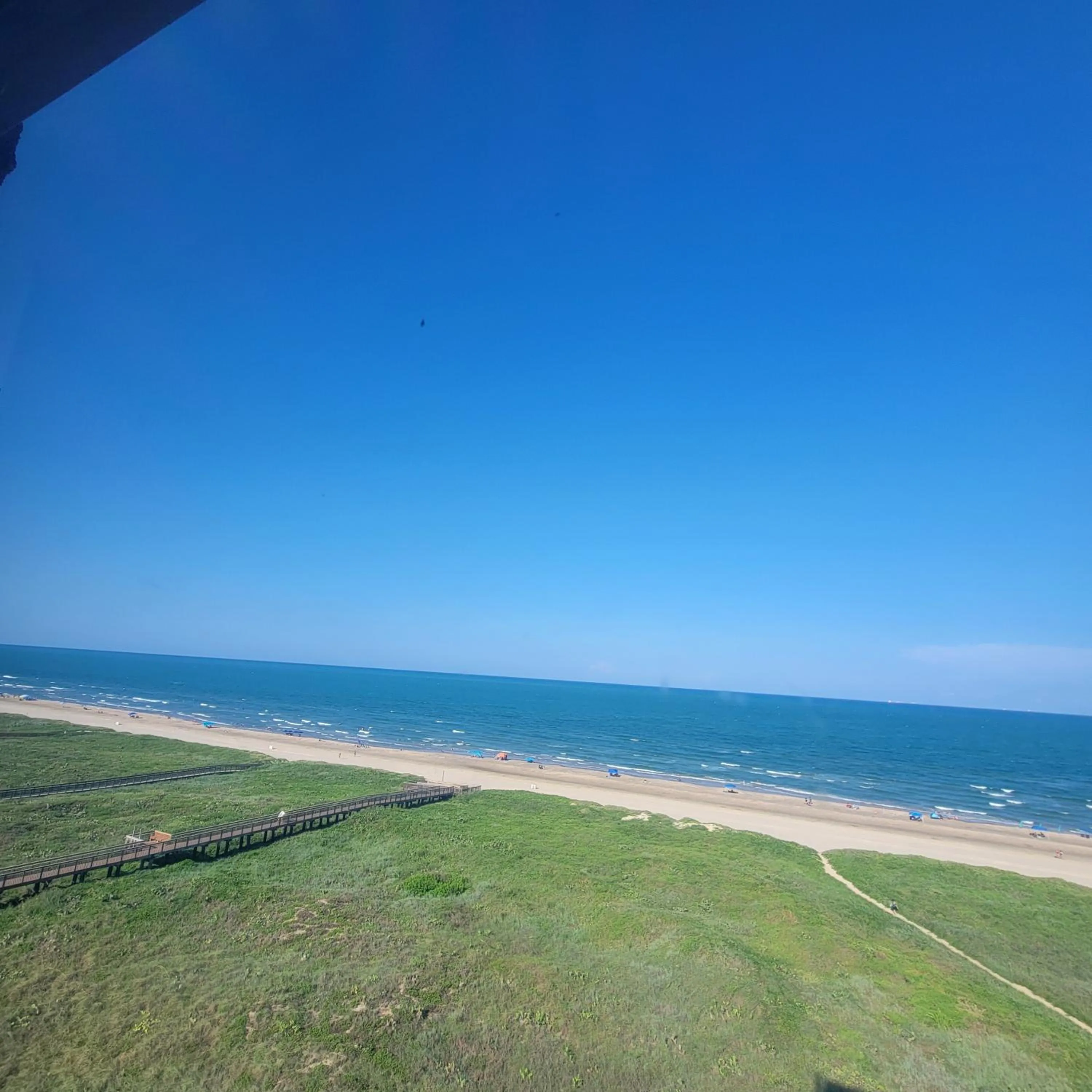 Standard Queen Room with North Partial Ocean View in Padre South Hotel On The Beach
