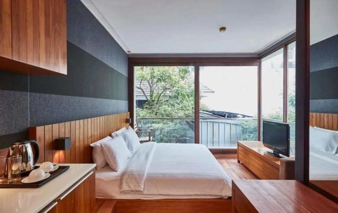 Studio Corner King Bed in LUXX Langsuan Hotel - SHA Plus