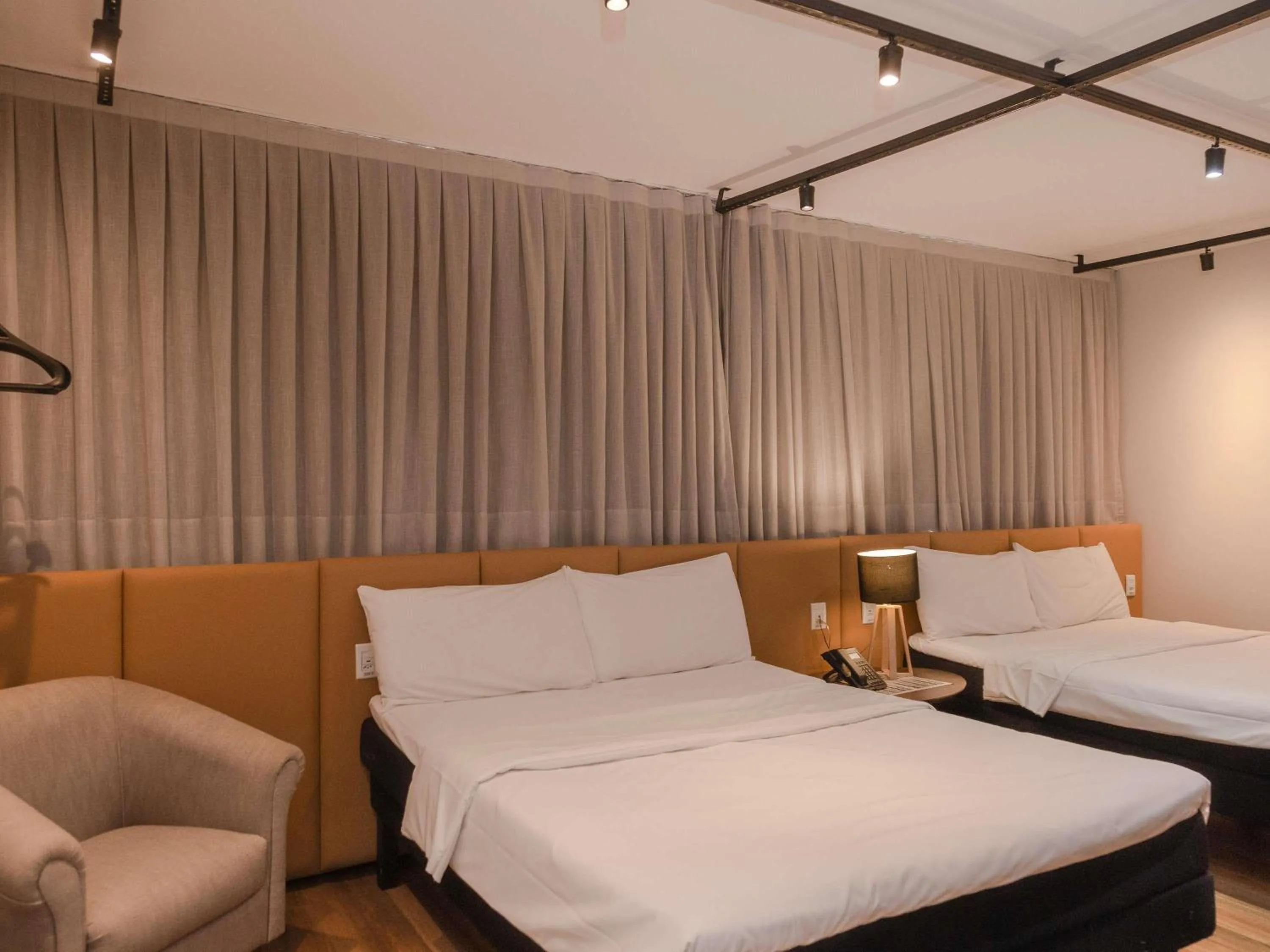 Superior Room with Two Double or One Queen and Two Twin Beds in ibis Catanduva
