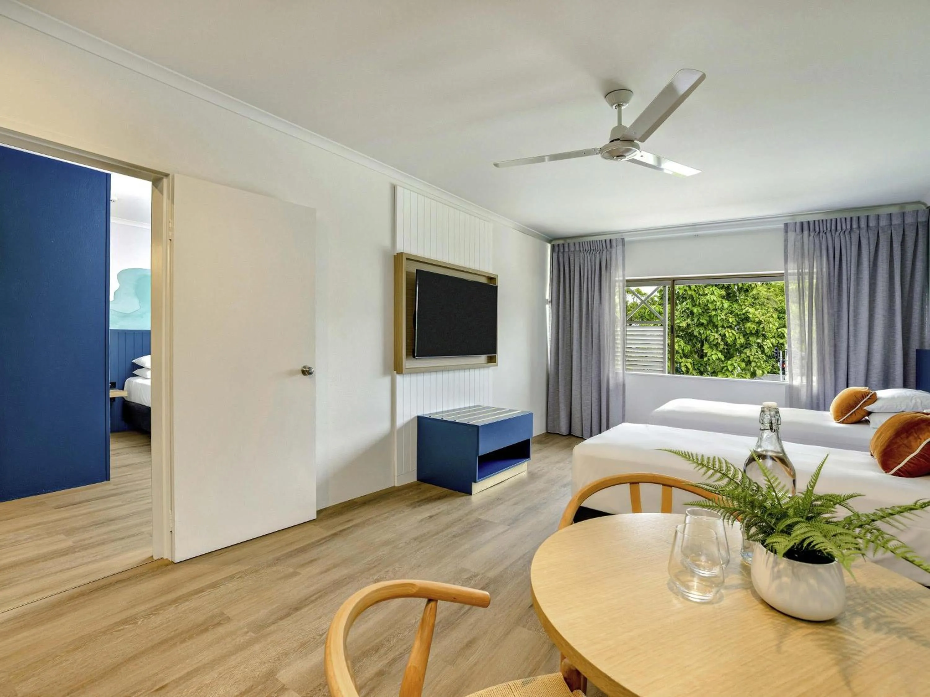 Family Room with One Queen and Two Twin Beds in Mercure Cairns