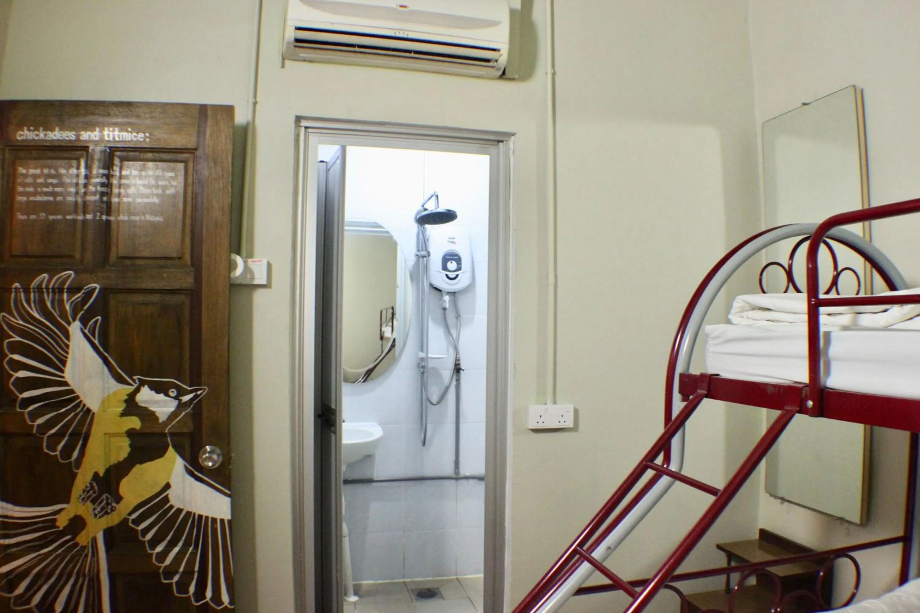 Standard Triple Room in Birdnest Guesthouse, Gaia Rooftop Cafe