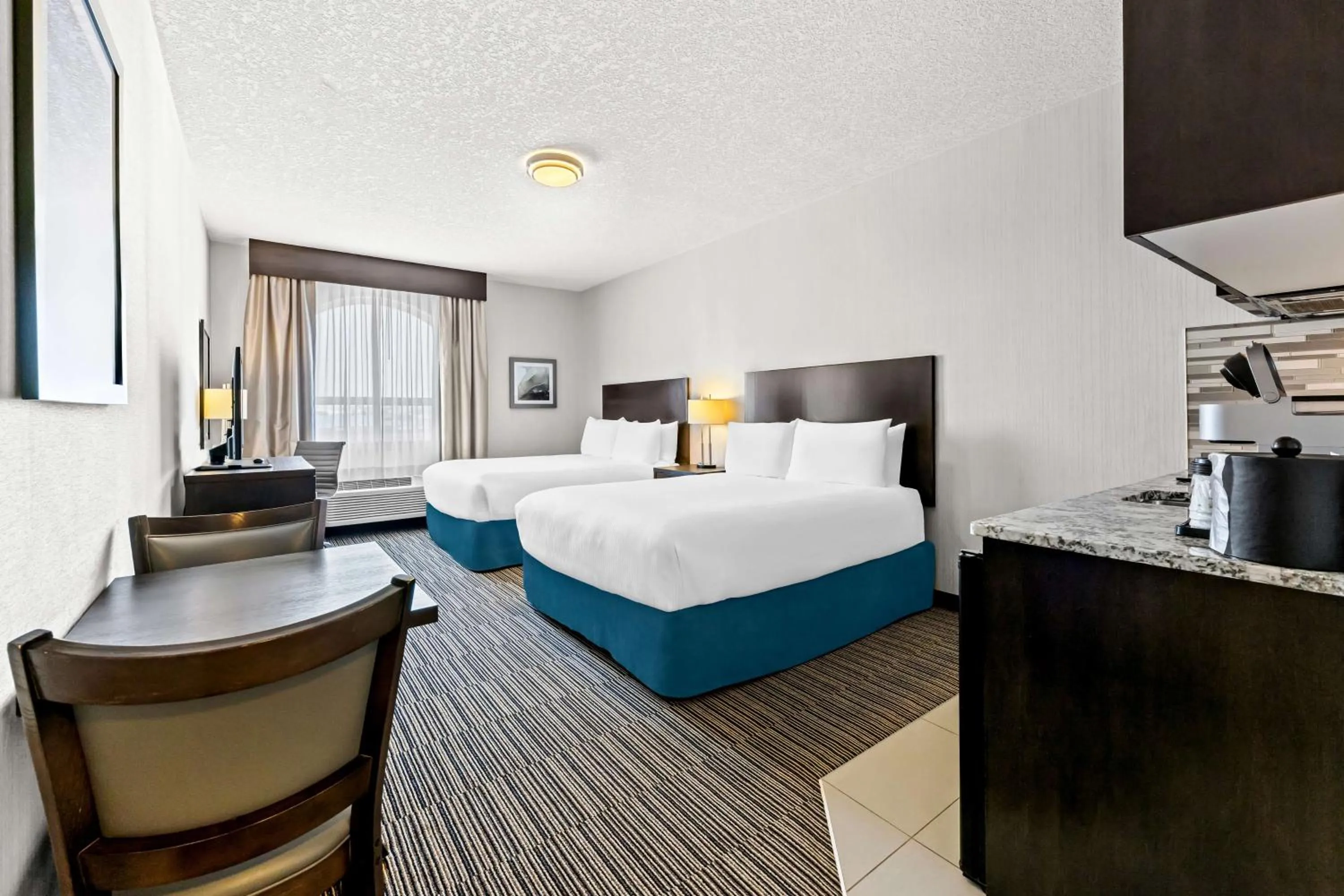 Queen Room with Two Queen Beds and Kitchenette - Non-Smoking in Best Western Plus Airdrie Gateway