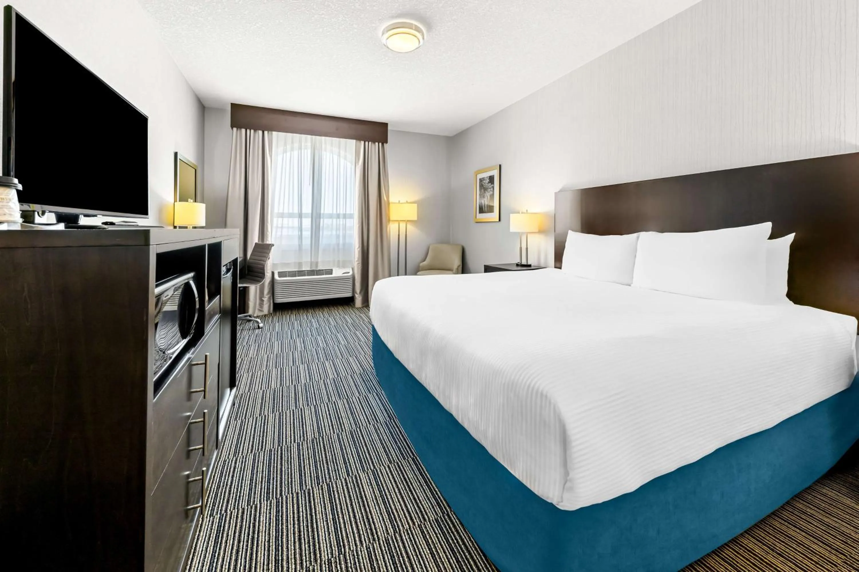 King Room with Roll-In Shower - Disability Access in Best Western Plus Airdrie Gateway