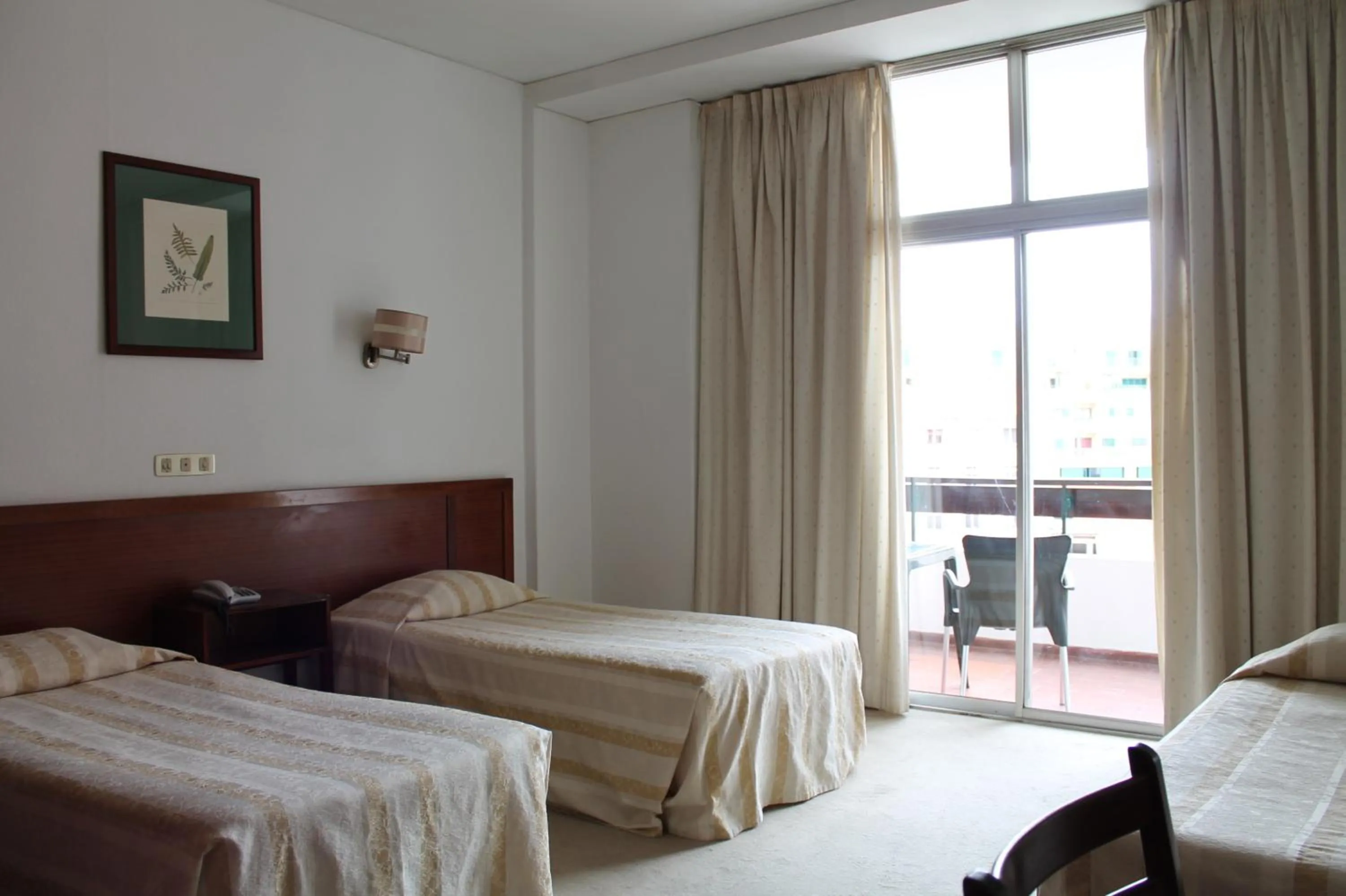 Triple Room in Residencial Greco