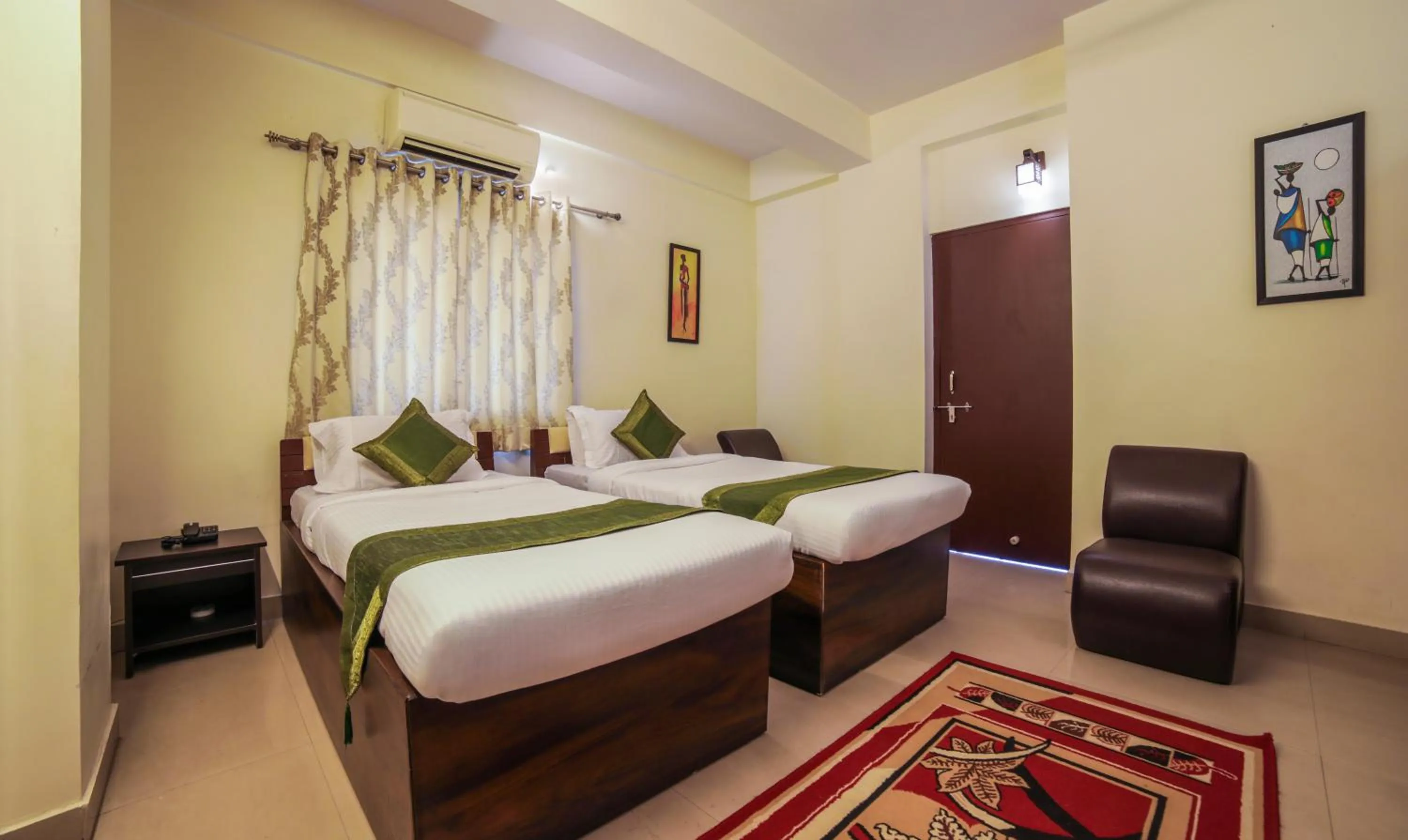 Standard Room with Balcony - single occupancy in Treebo Ivory House