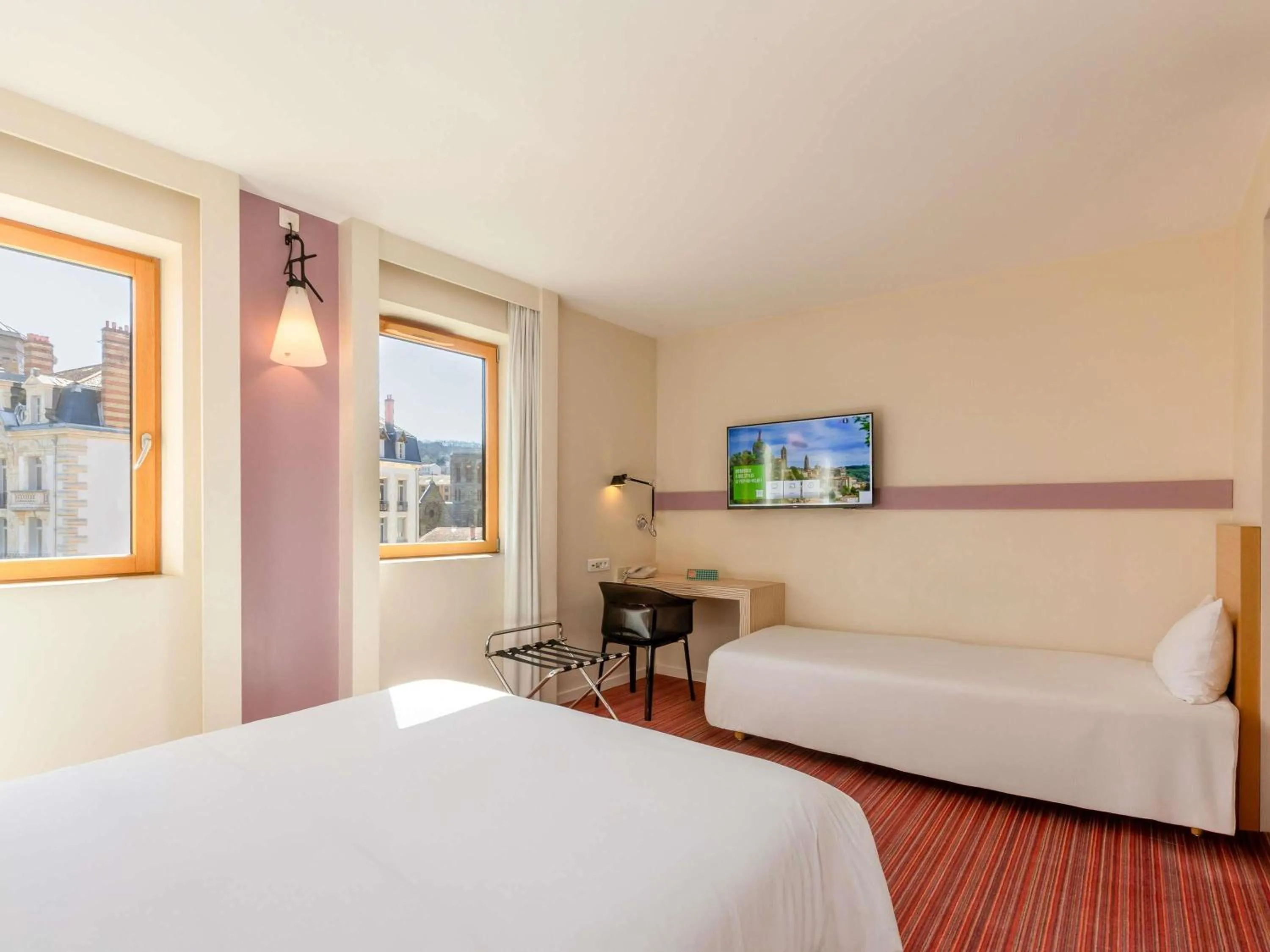 Standard Family Suite with One Double Bed and Twin Beds in ibis Styles Le Puy en Velay