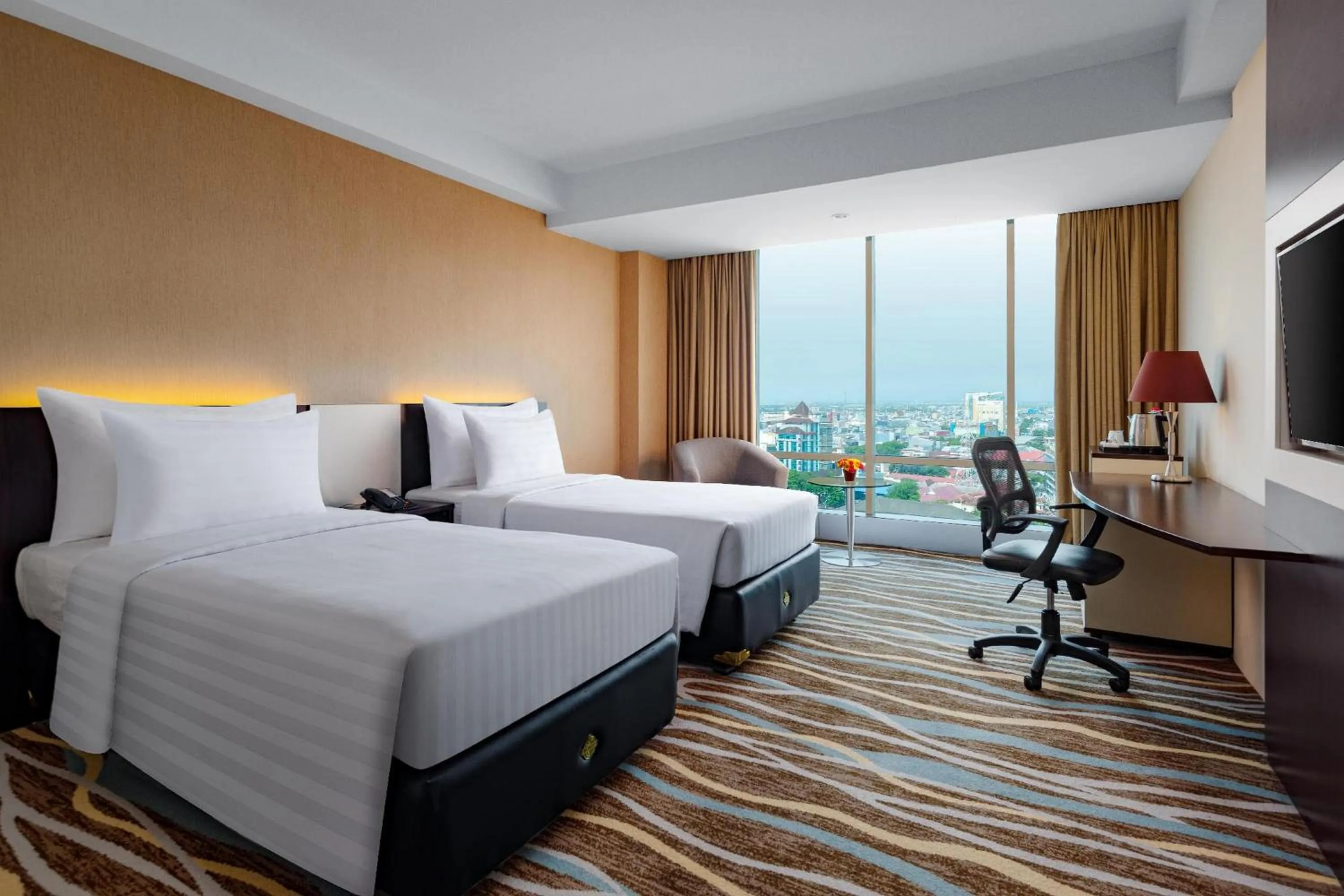 Deluxe Twin Room in Swiss-Belhotel Makassar