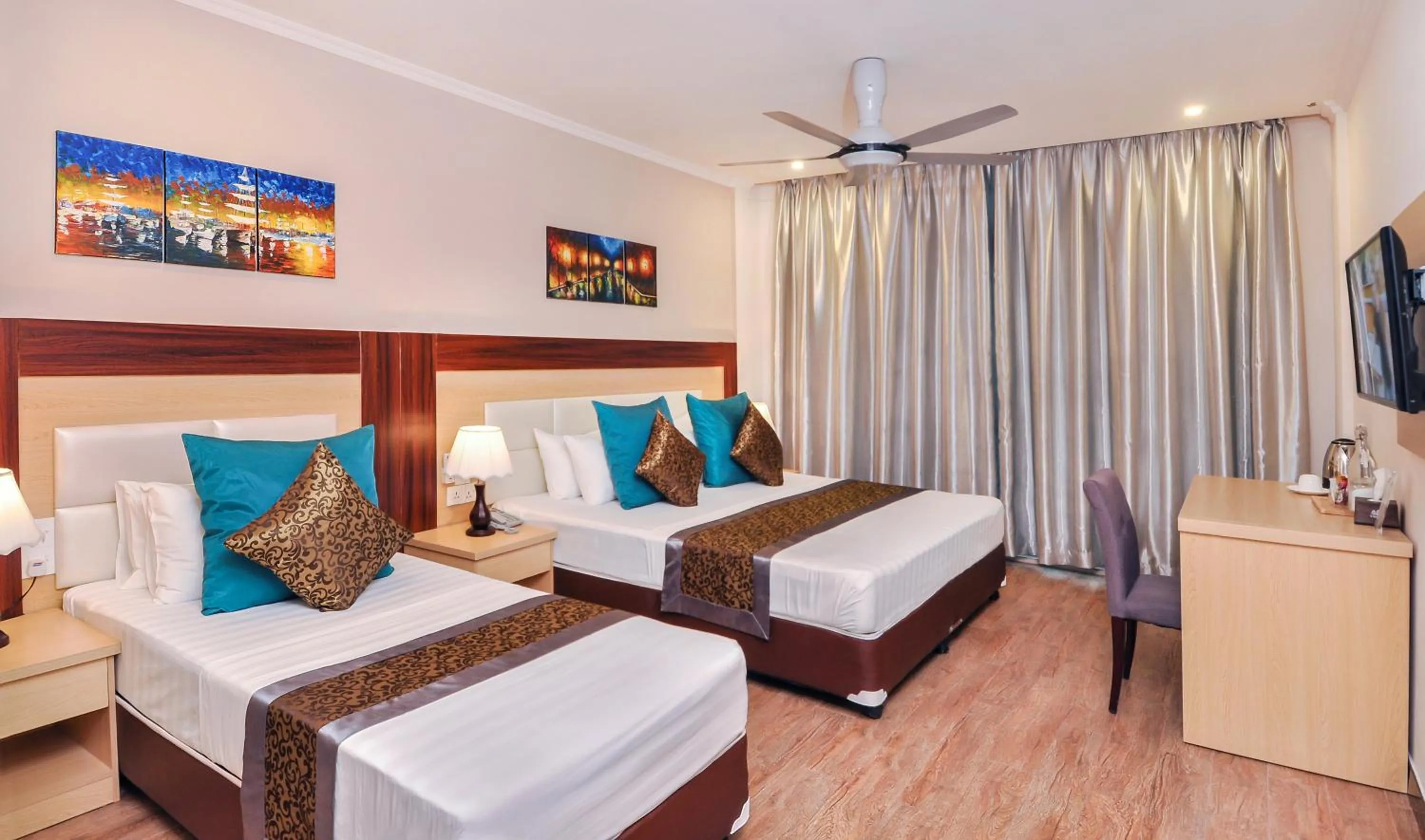 Deluxe Triple Room with Pool View in Triton Beach Hotel & Spa